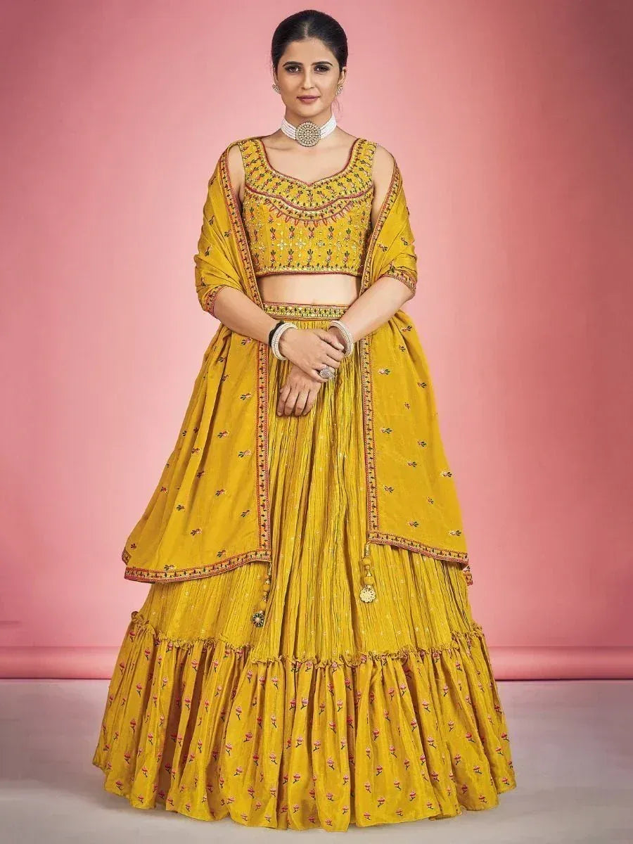Yellow embroidered lehenga choli with floral print and dupatta, perfect for Indian ethnic occasions