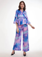 Woman in stylish pastel tie-dye ethnic co-ord set with flared sleeves from Ethnic Plus