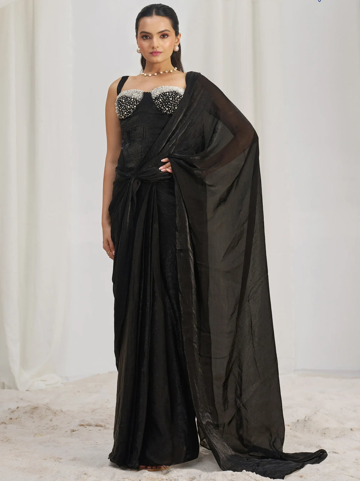 Elegant black saree with embellished blouse, perfect for Indian ethnic wear occasions