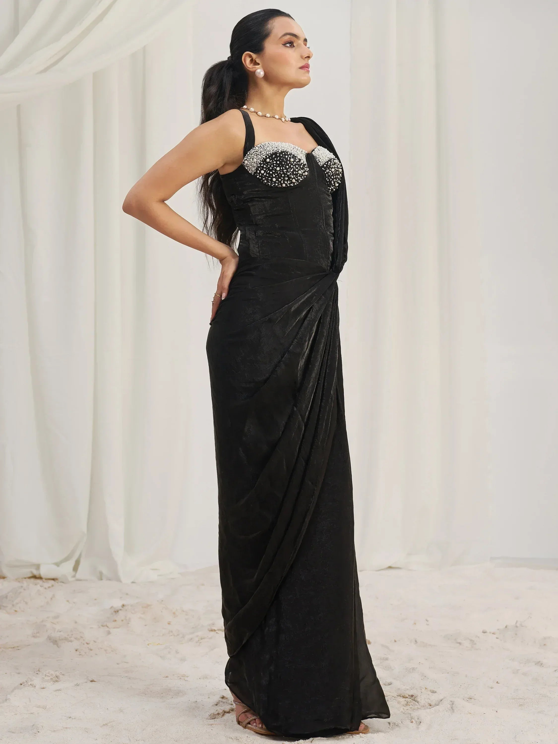 Black velvet saree with embellished blouse, elegant ethnic wear for special occasions