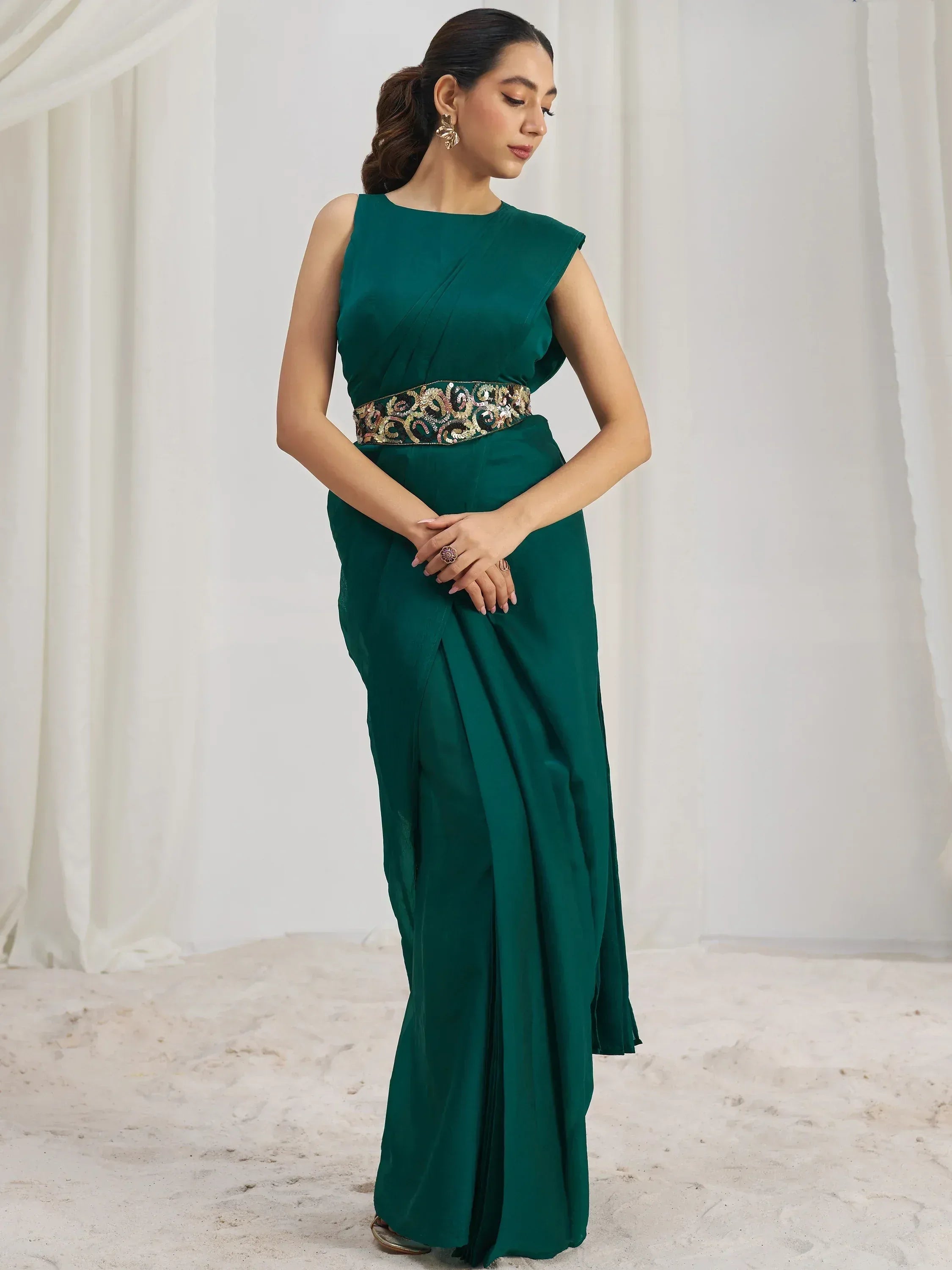 Emerald green saree with embroidered waistband, elegant ethnic wear for women