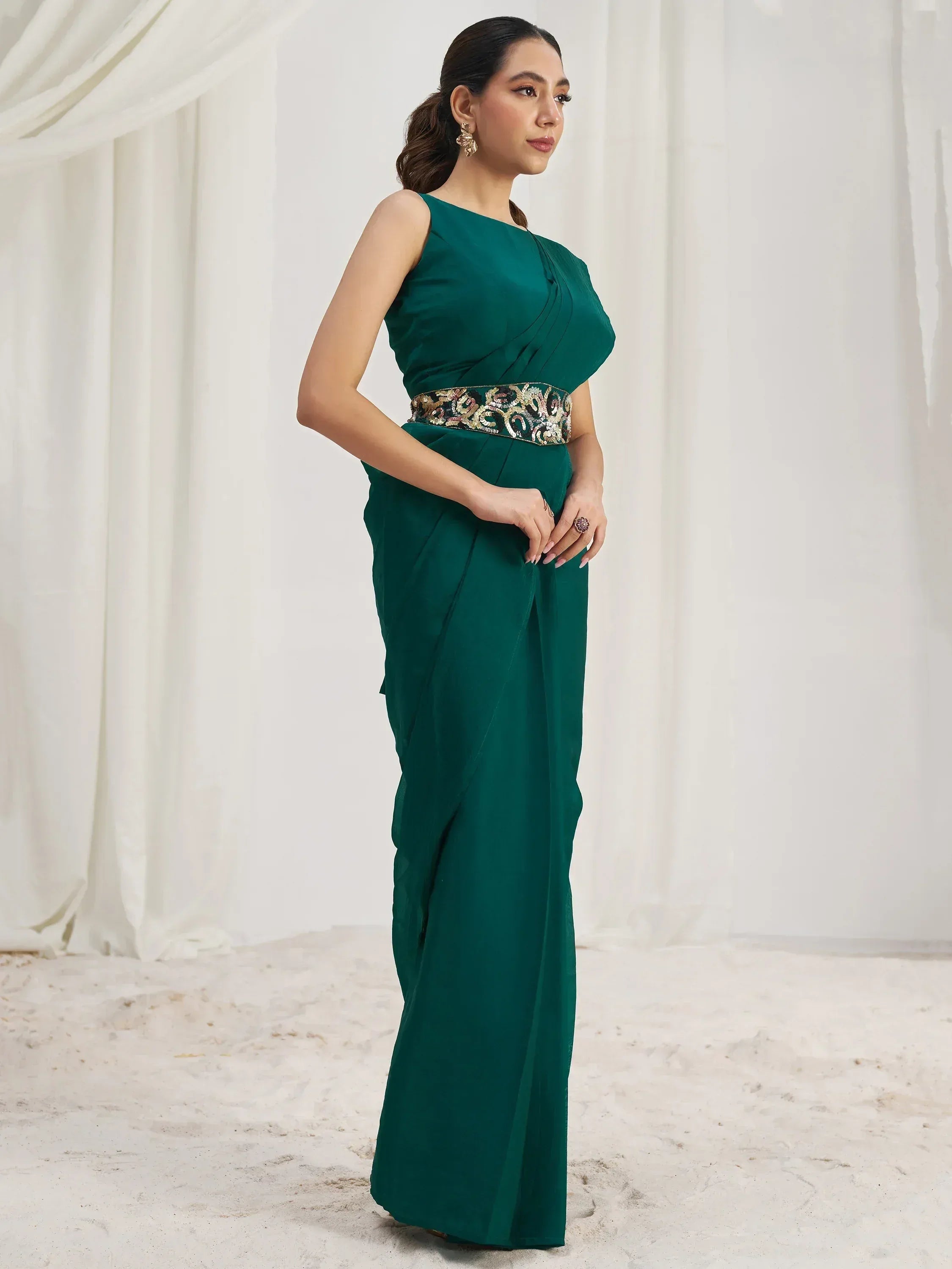 Emerald green saree with embroidered waist belt, elegant ethnic wear for women