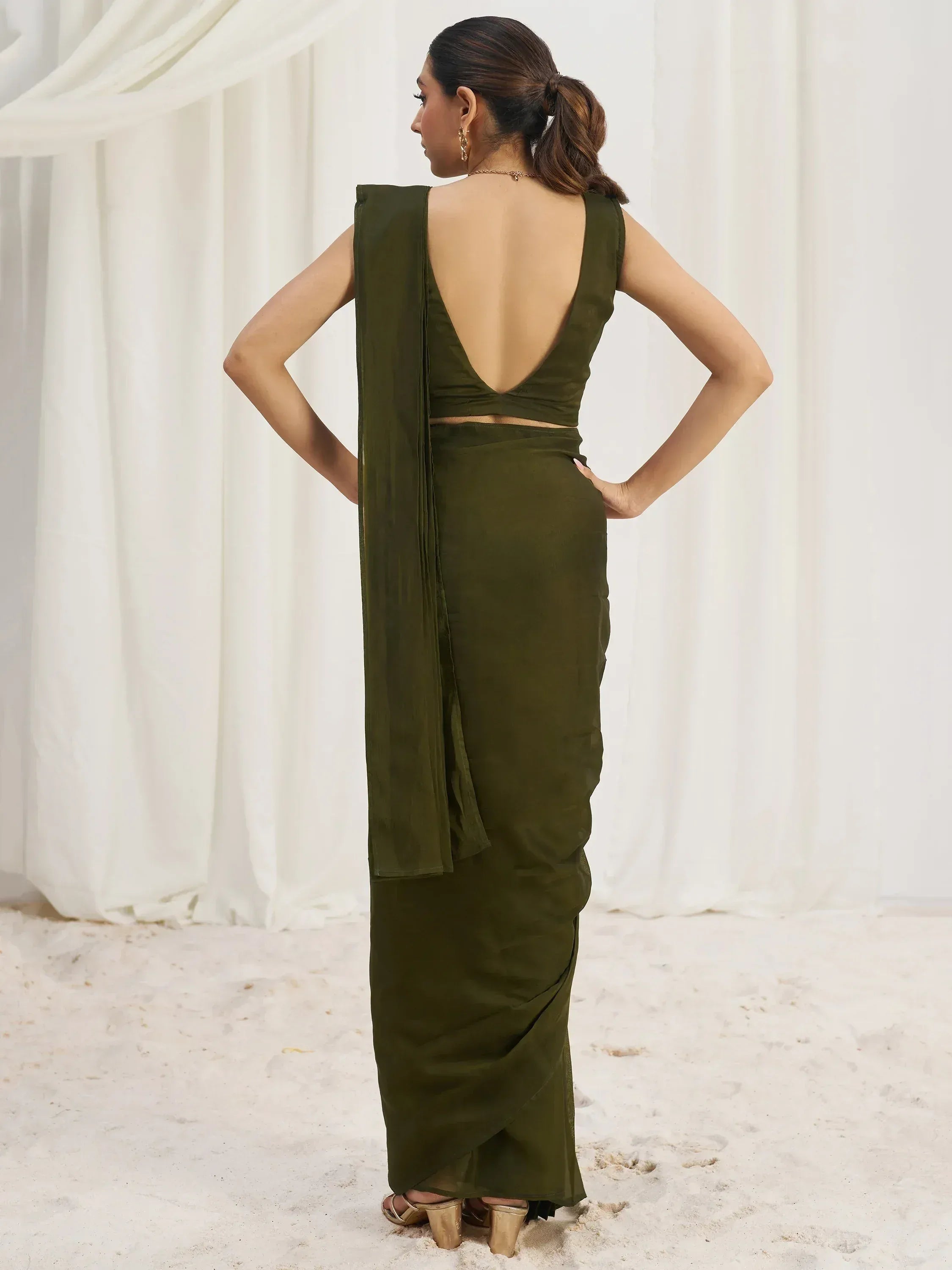 Olive green saree with backless blouse, stylish ethnic wear for women