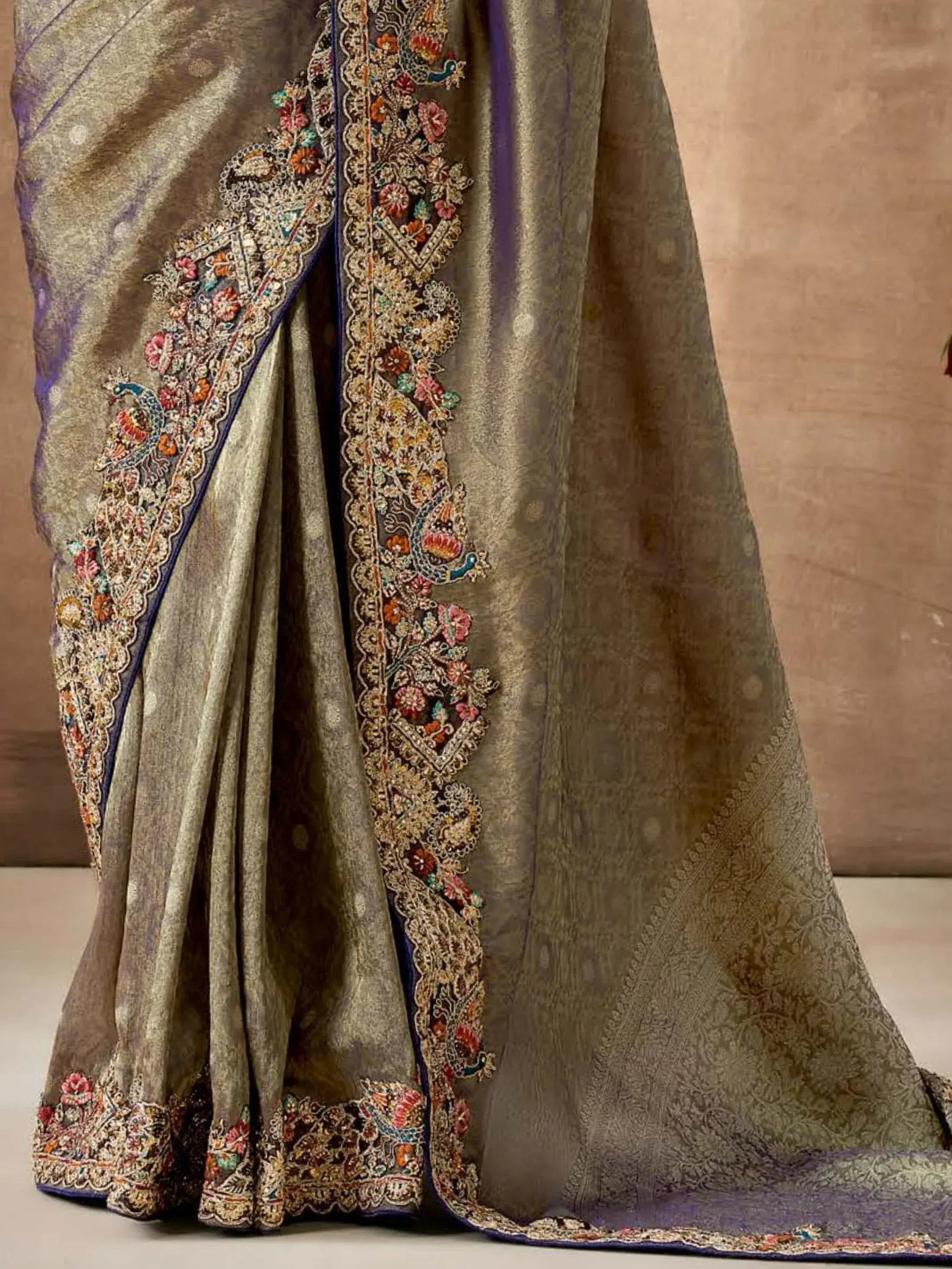 Elegant grey saree with peacock and floral embroidery, perfect for Indian ethnic wear occasions.
