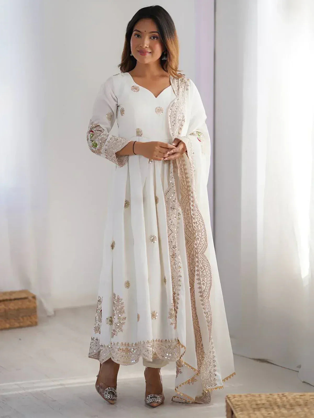 White embroidered anarkali suit with gold detailing, perfect for Indian ethnic wear occasions
