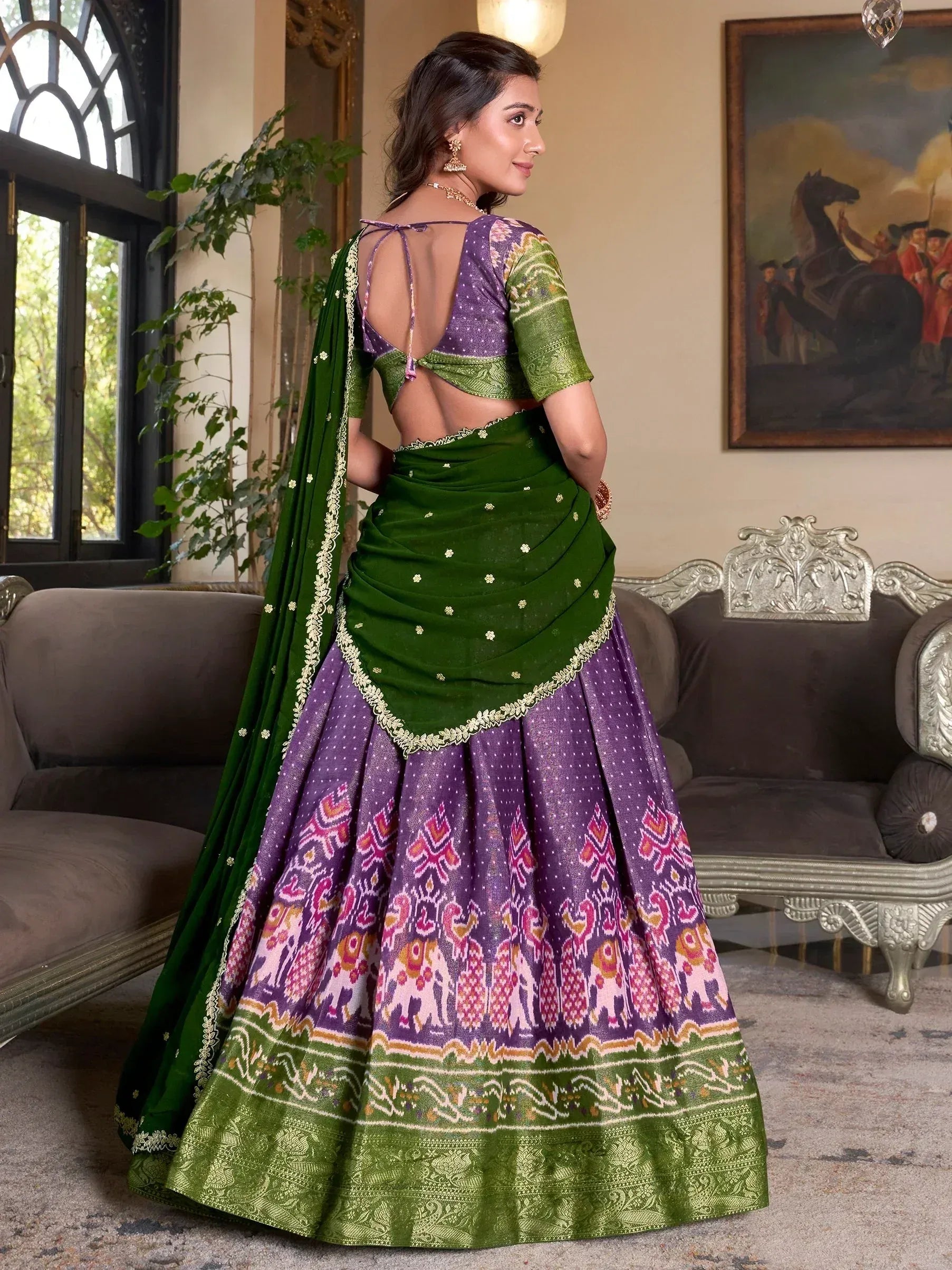 Purple and green designer lehenga choli with elephant print, backless blouse, and embroidered dupatta for Indian ethnic wear.