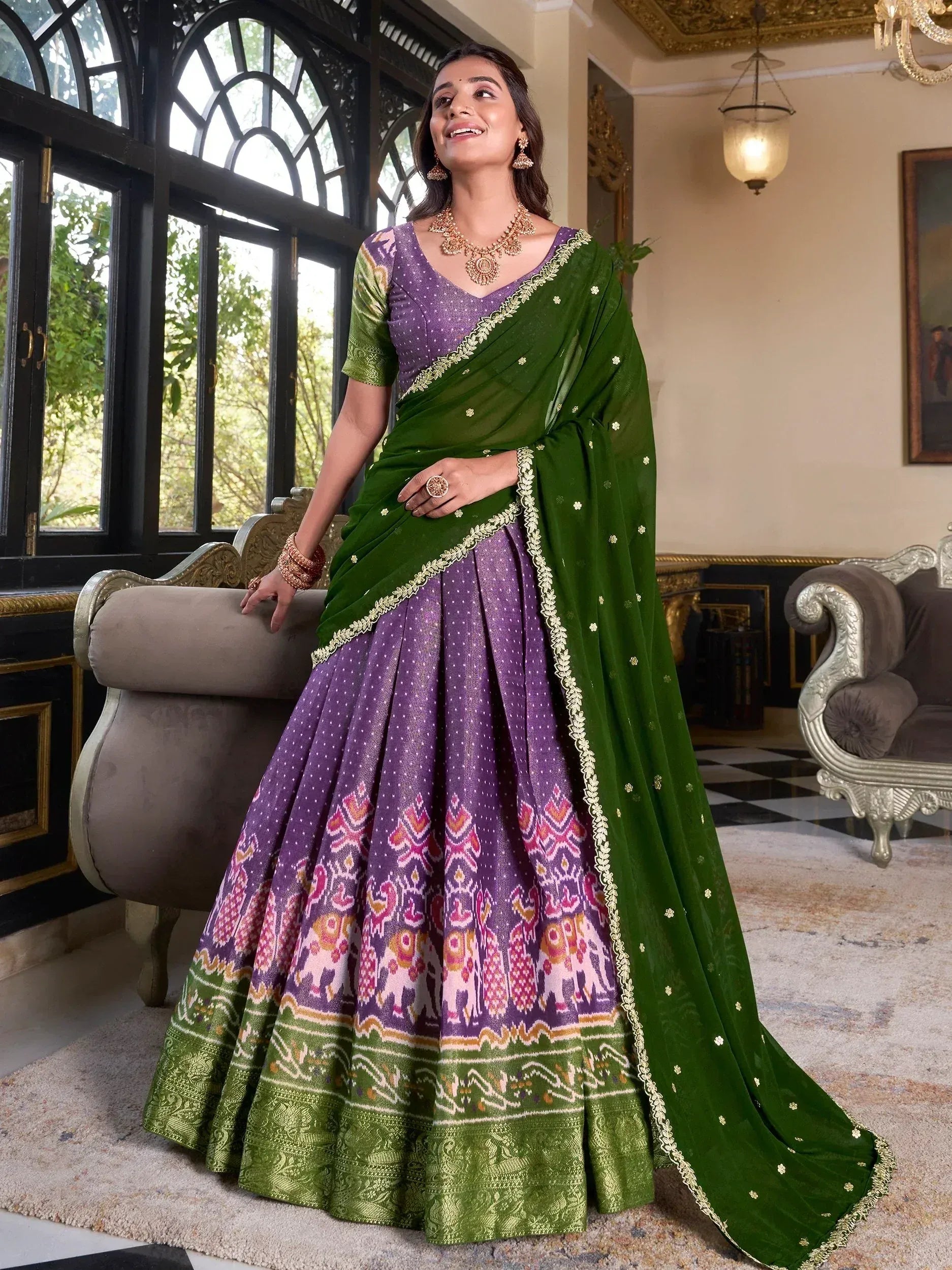 Purple and green designer lehenga choli with elephant print, perfect for Indian ethnic wear occasions