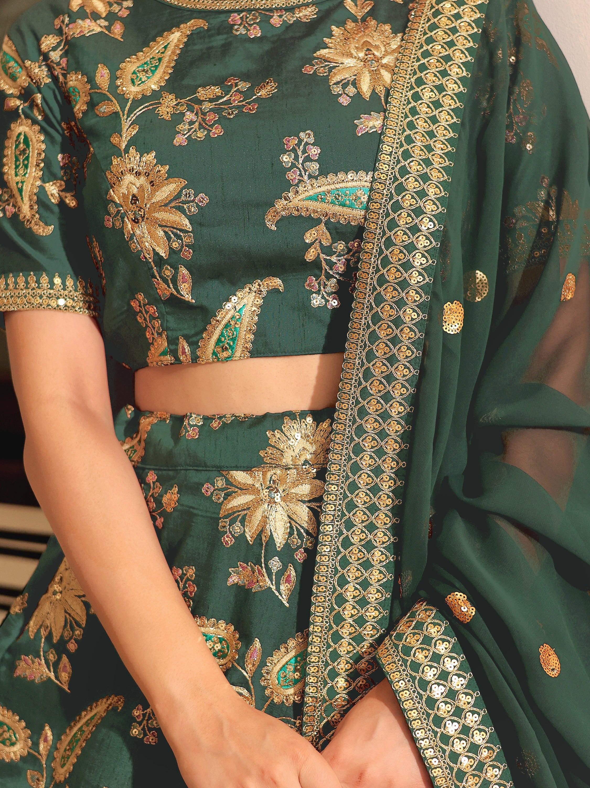 Emerald green lehenga choli with gold floral embroidery and sequin detailing for Indian ethnic wear