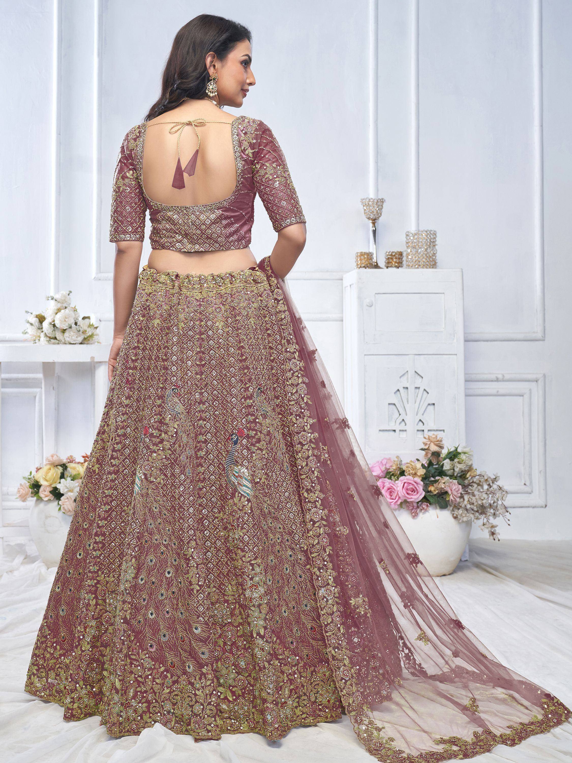 Elegant maroon lehenga choli with peacock embroidery and back tie blouse, perfect for Indian weddings