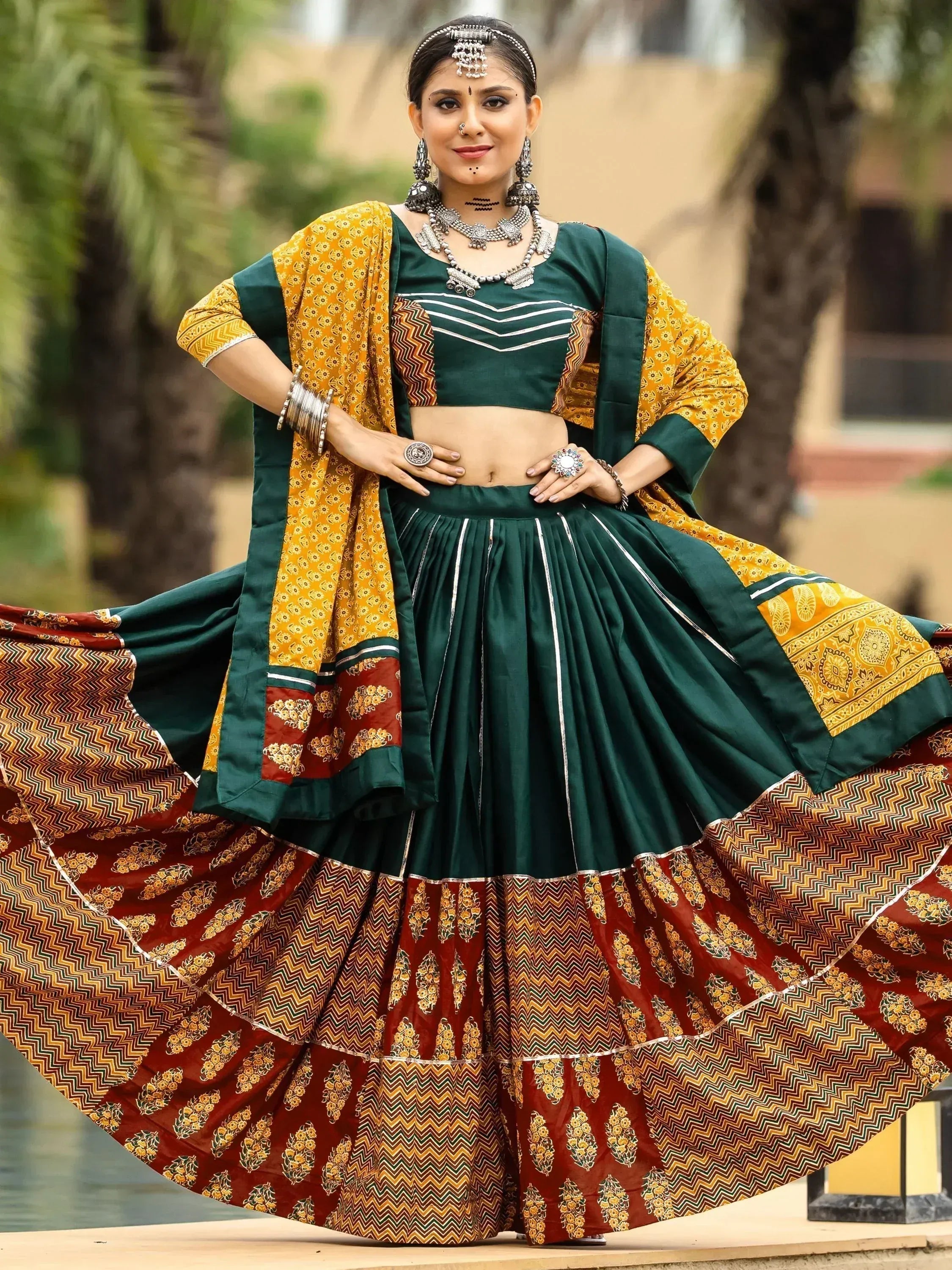 Green and mustard Indian lehenga choli with printed dupatta, perfect for ethnic wear and festive occasions
