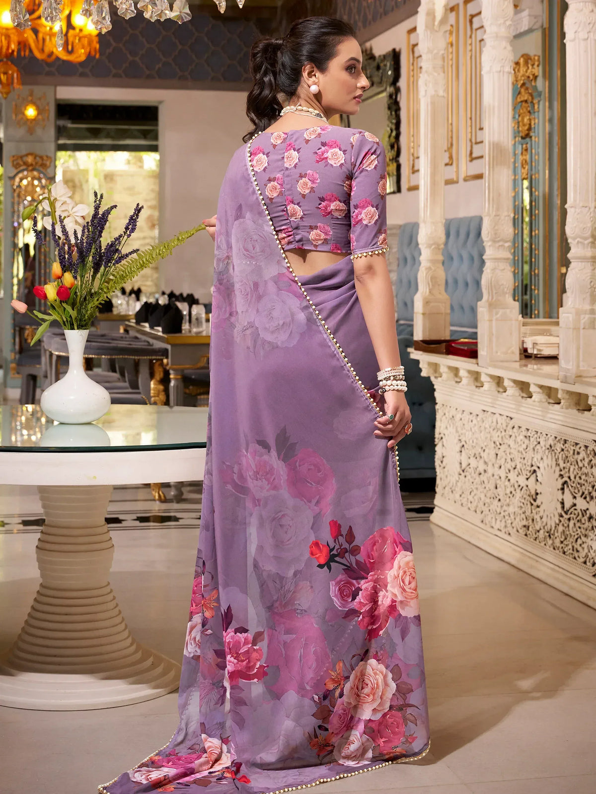 Purple floral saree with pearl trim, elegant Indian ethnic wear for women