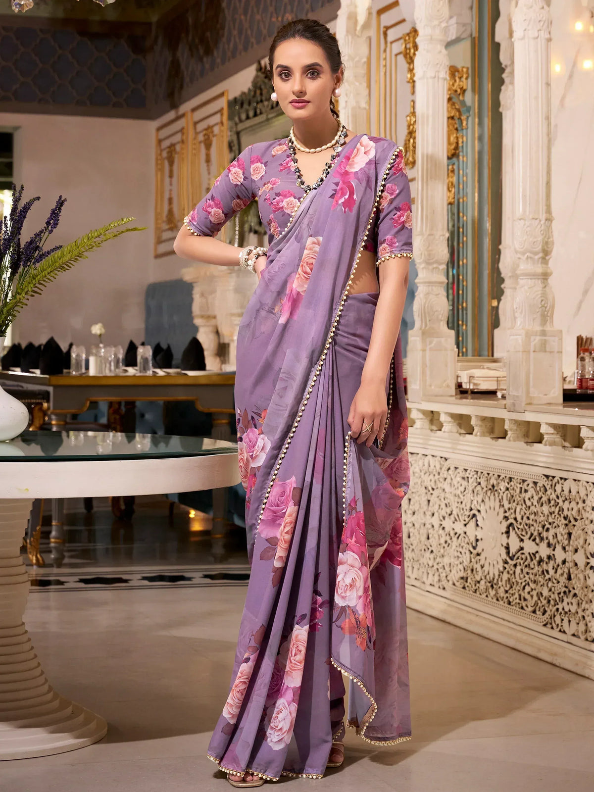 Purple floral saree with gold trim, elegant Indian ethnic wear for women