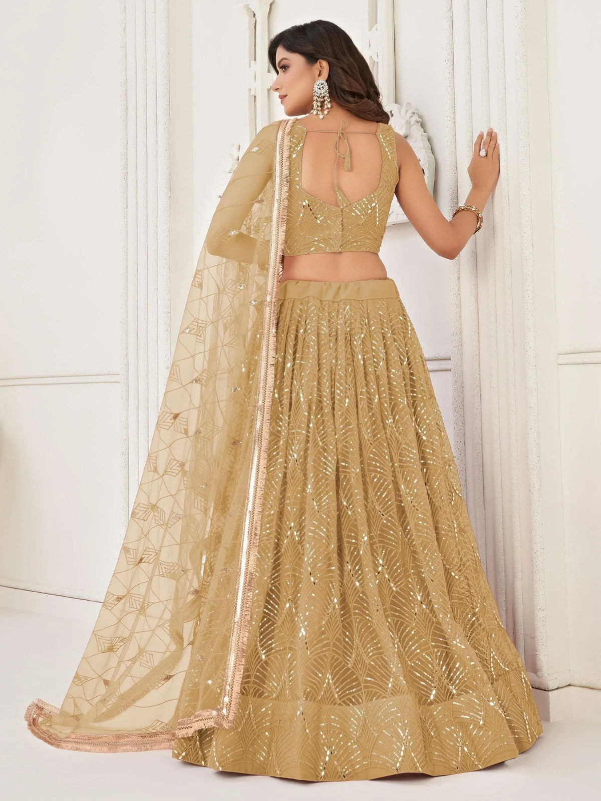 Gold sequin lehenga choli with sheer dupatta, ethnic Indian wear for weddings and parties