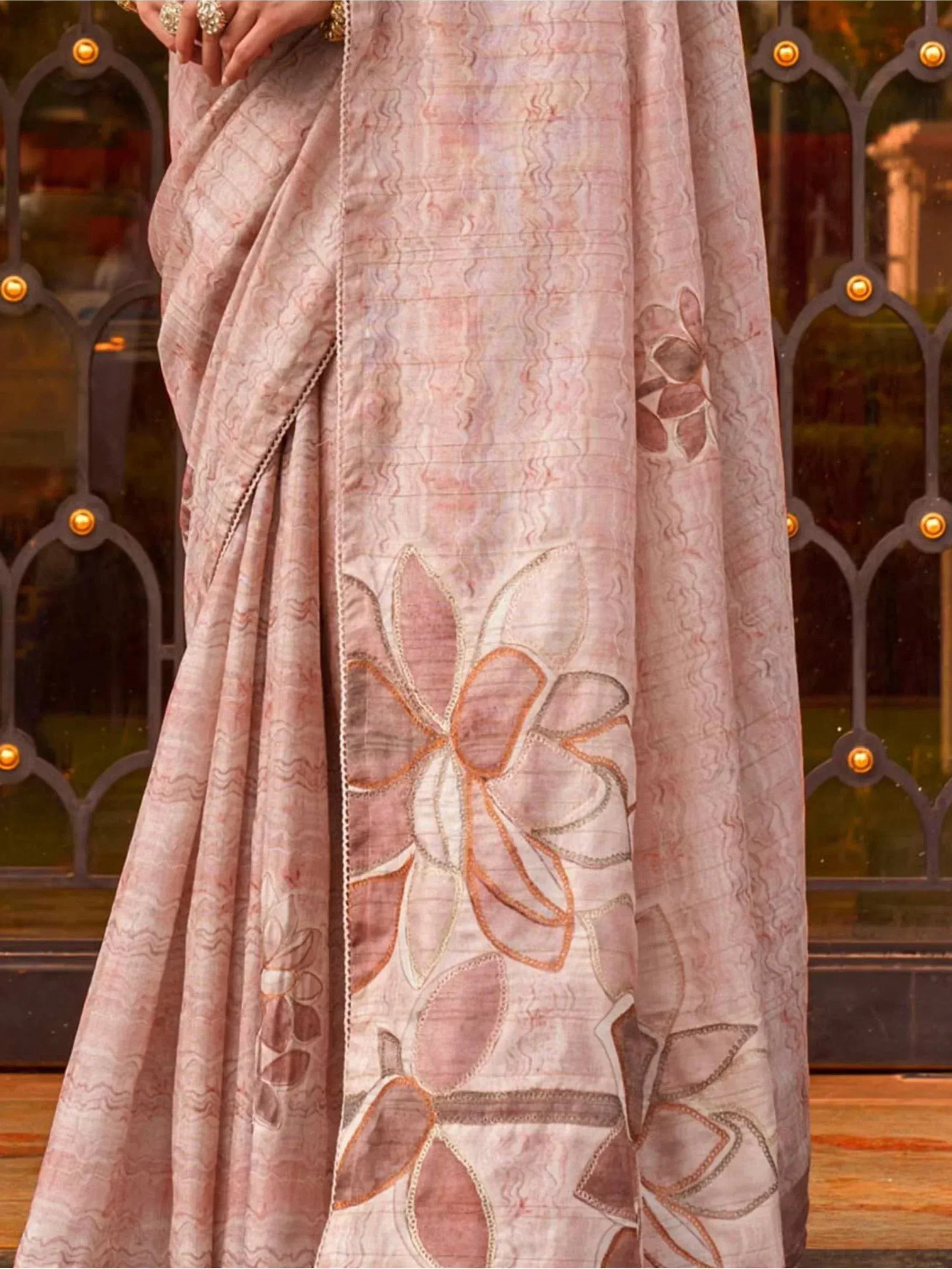 Pink floral embroidered saree with intricate detailing, perfect for ethnic occasions