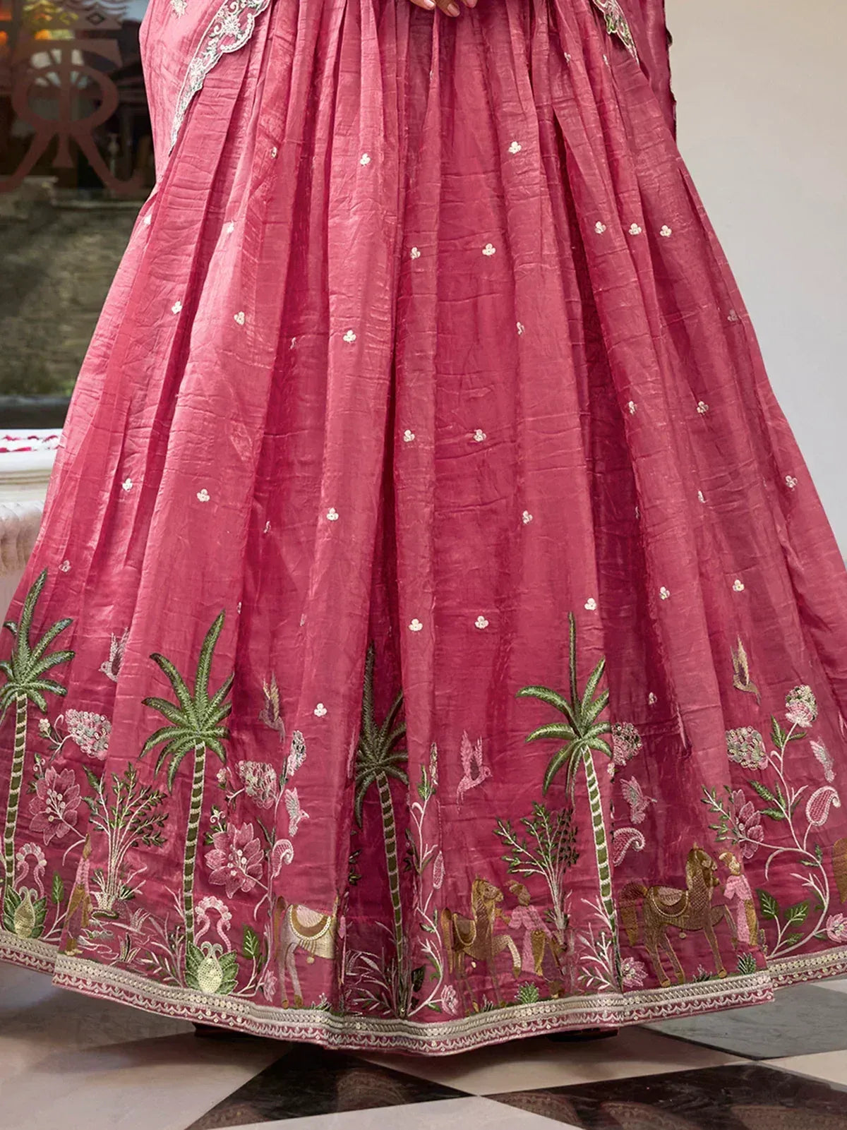 Pink embroidered lehenga with palm trees, horses, and floral motifs for Indian ethnic wear