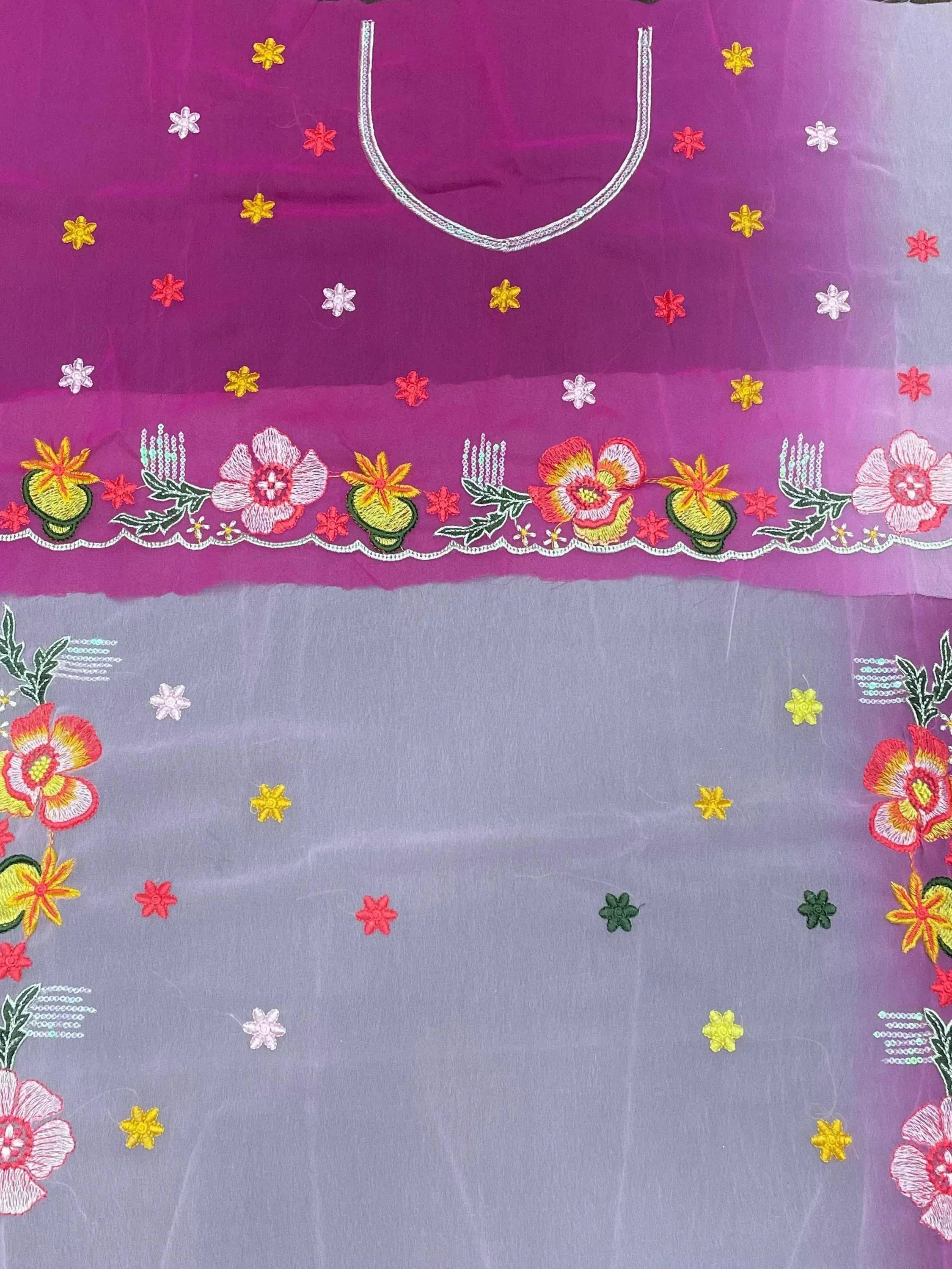 Purple and gray ethnic dress with floral embroidery and colorful patterns