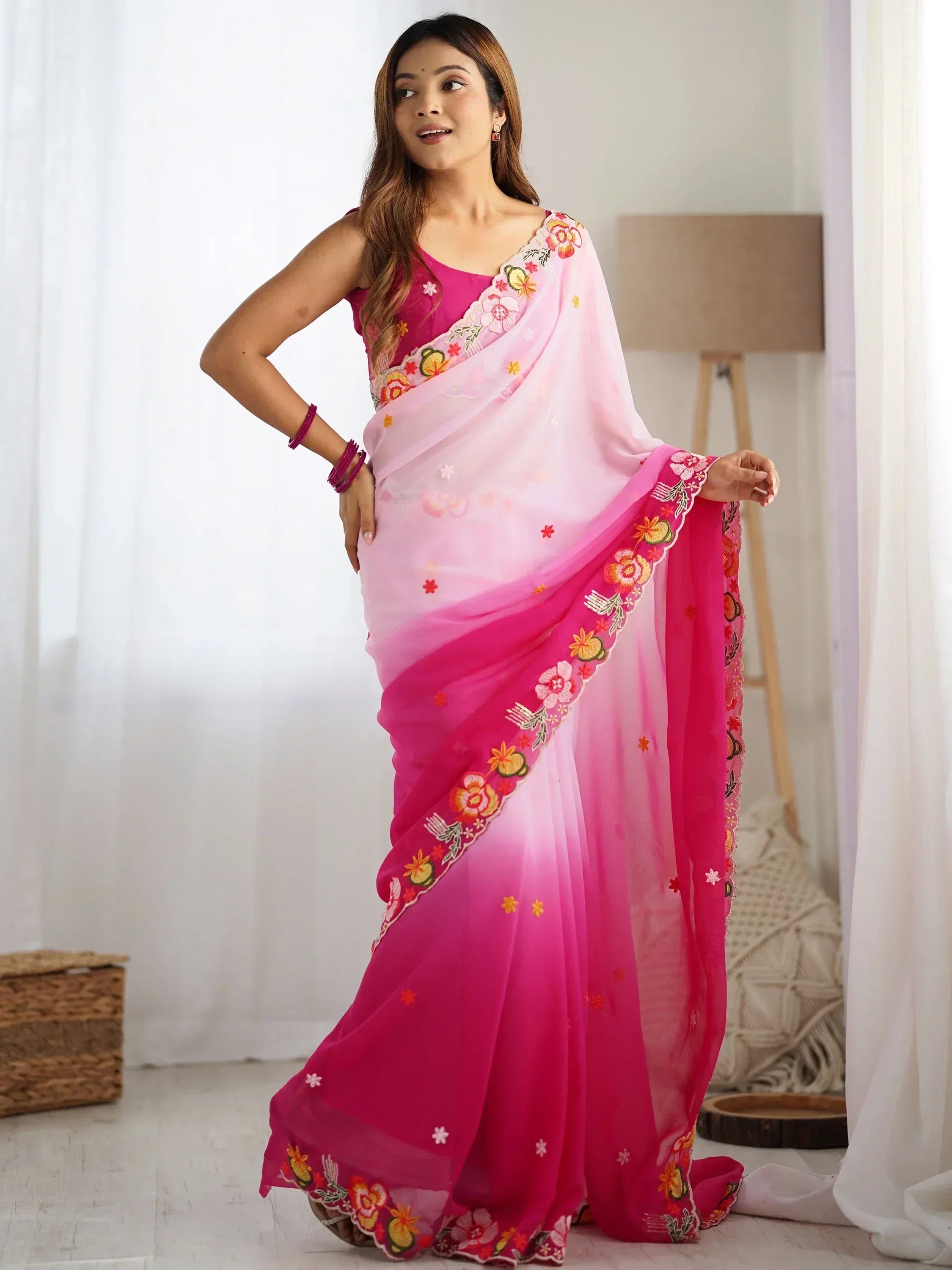 Pink floral embroidered saree with ombre effect, perfect for ethnic occasions