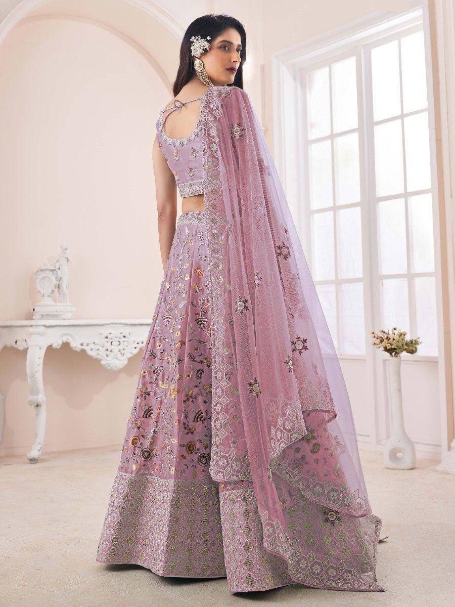 Elegant lavender lehenga choli with floral embroidery and sheer dupatta, perfect for Indian ethnic occasions.