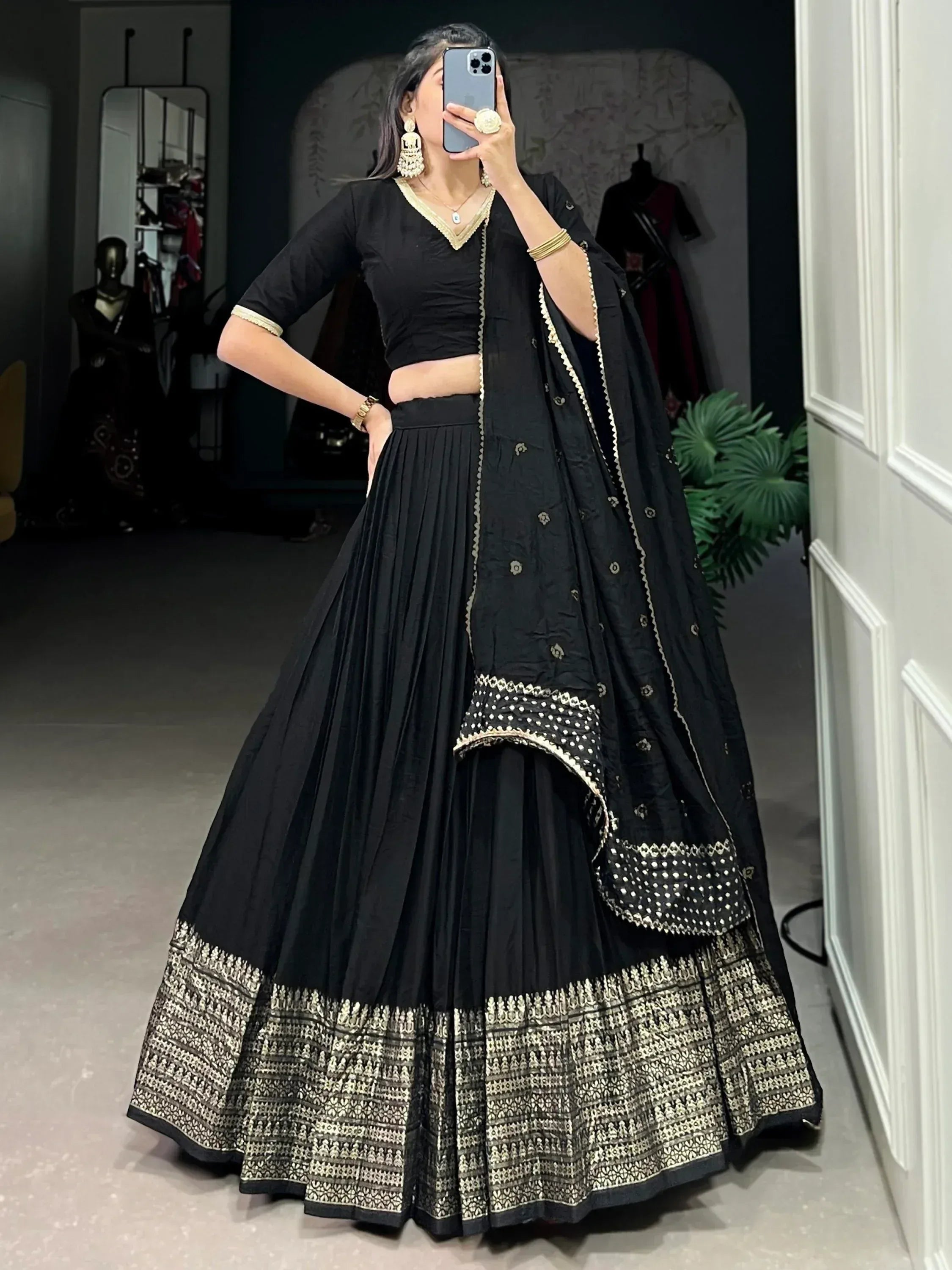 Black lehenga choli with gold embroidery, perfect for Indian ethnic wear and designer occasions.