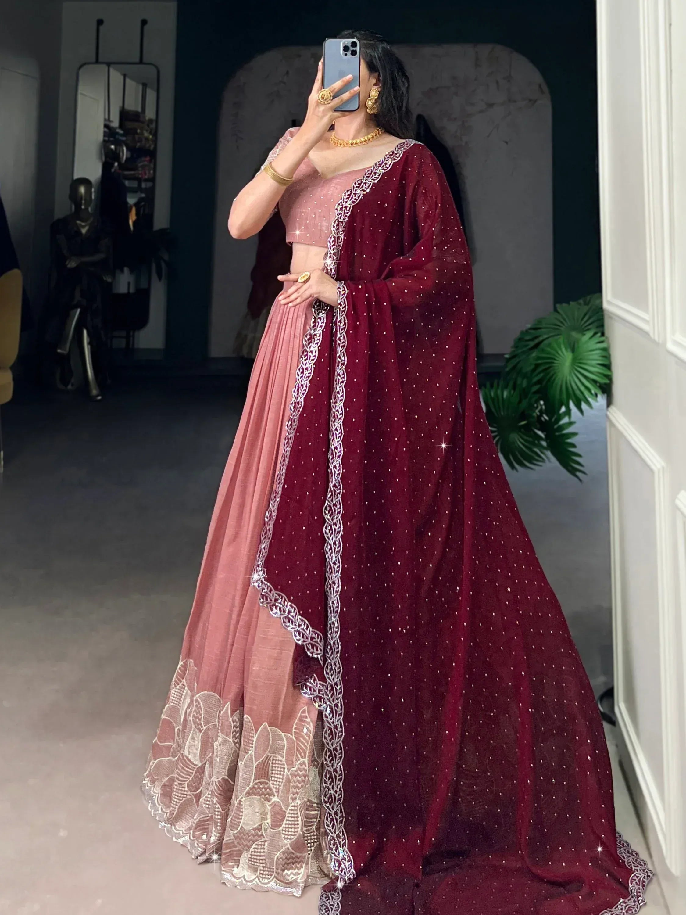 Elegant maroon and pink lehenga choli with sequin work, perfect for Indian ethnic wear occasions