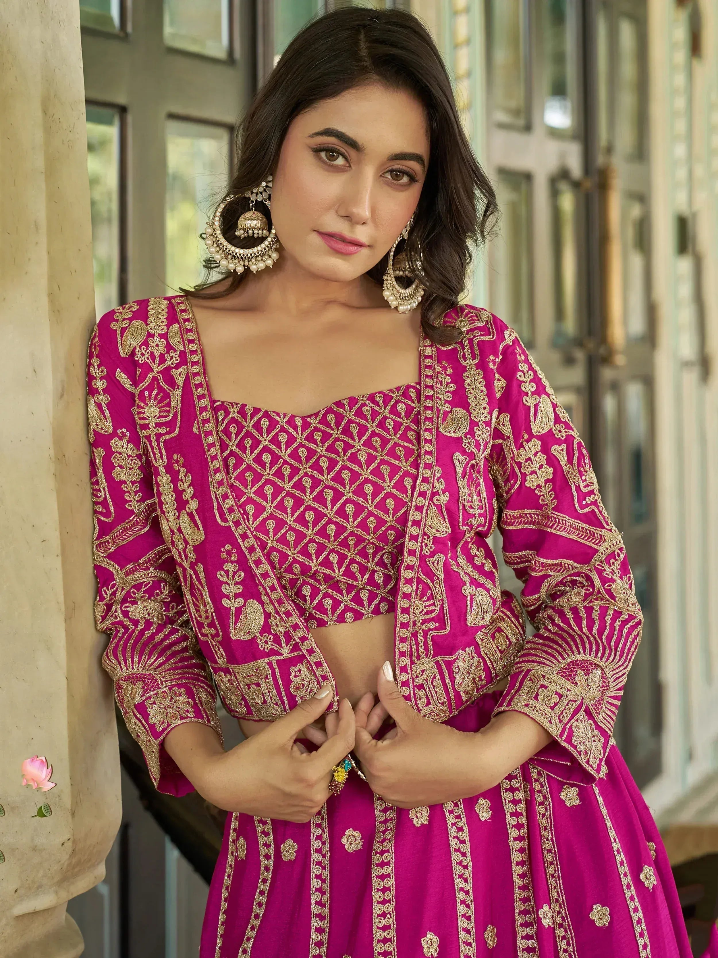 Pink embroidered lehenga choli with gold detailing, perfect for Indian ethnic wear occasions