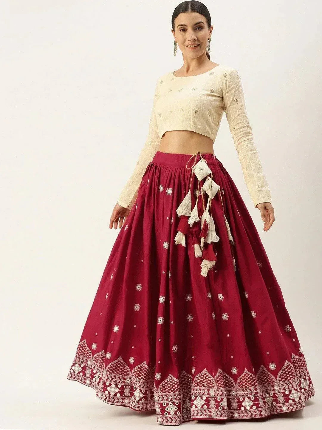 Maroon embroidered lehenga with cream crop top, perfect for Indian ethnic wear occasions