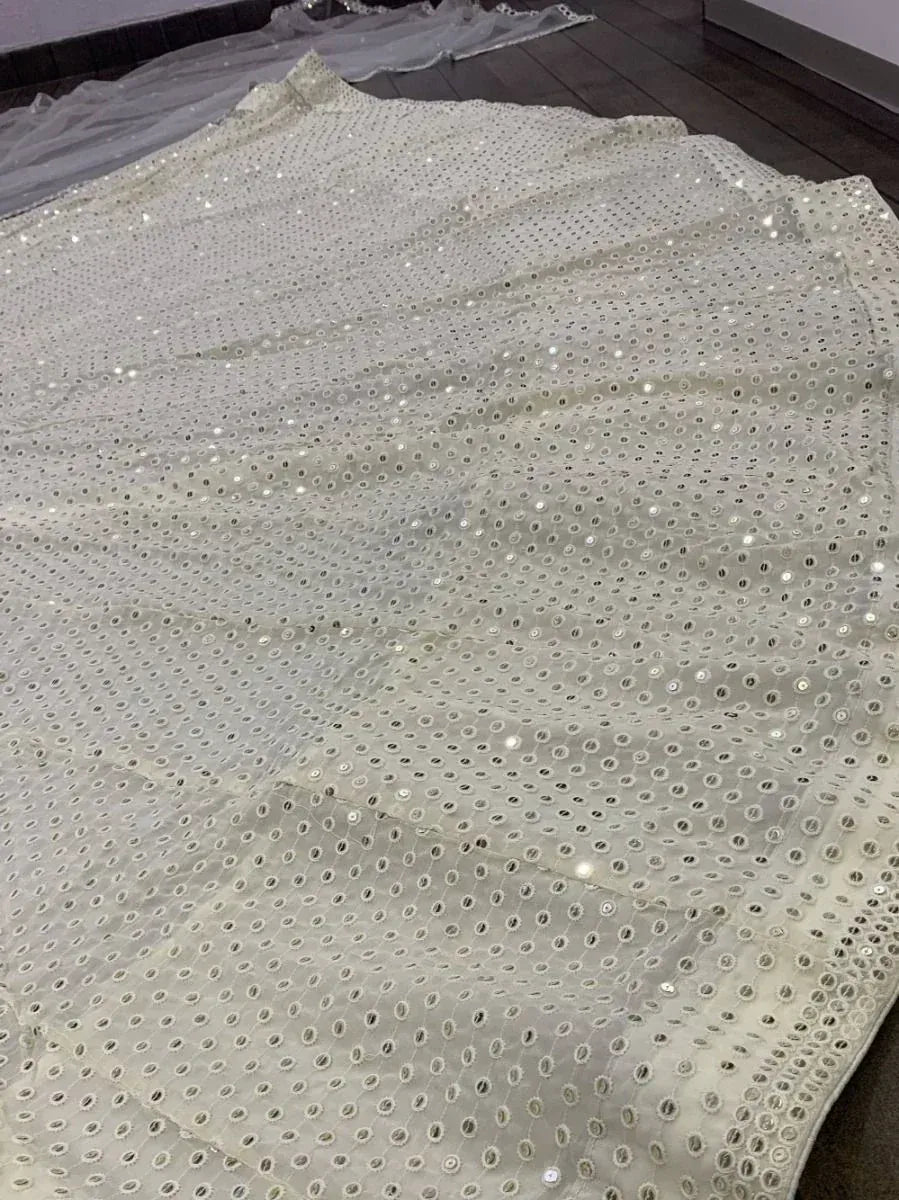 White ethnic gown fabric with mirror work and sequins, perfect for designer lehenga or saree