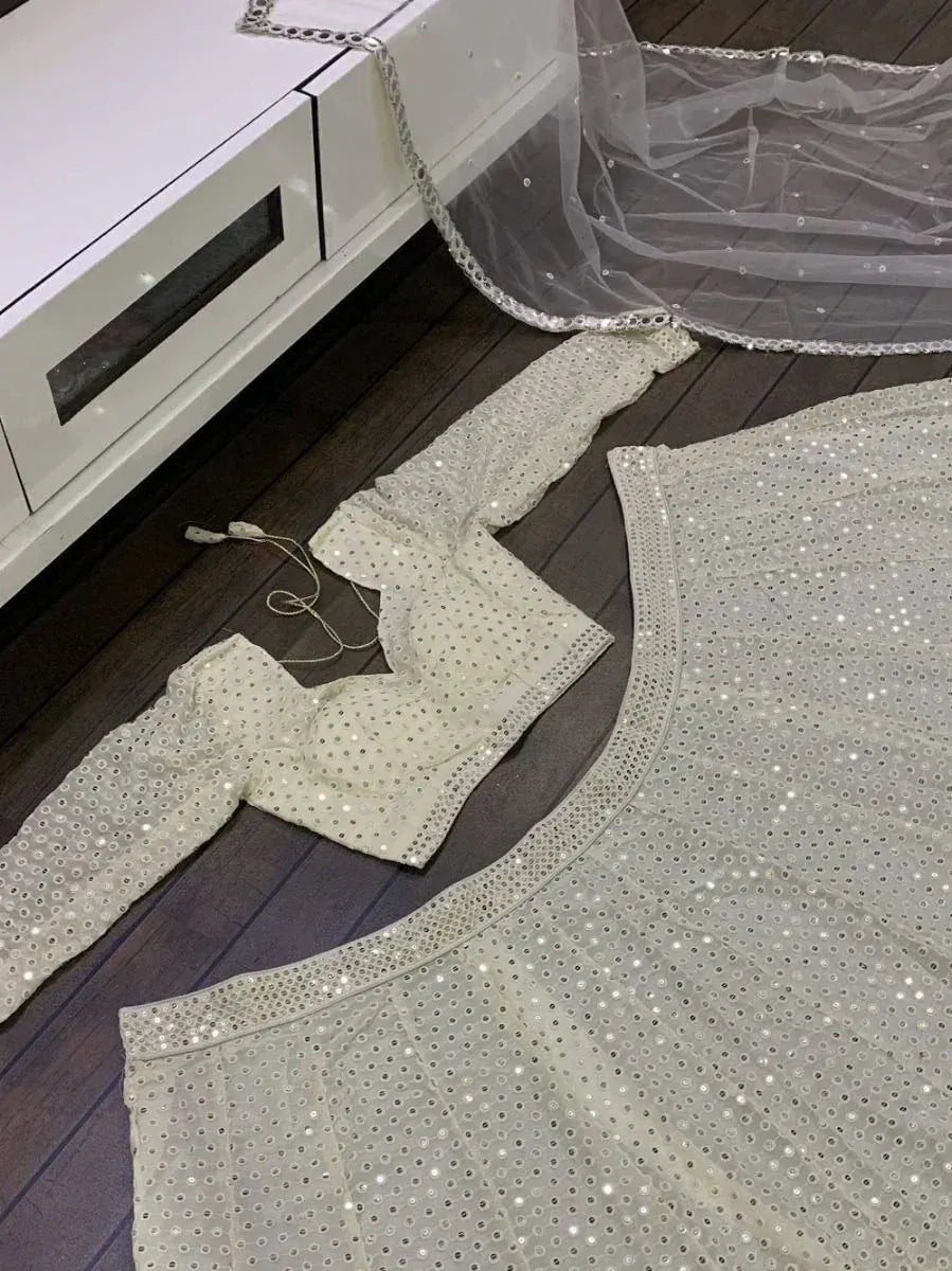 White mirror work lehenga choli with sheer dupatta, ethnic Indian wear for weddings and parties