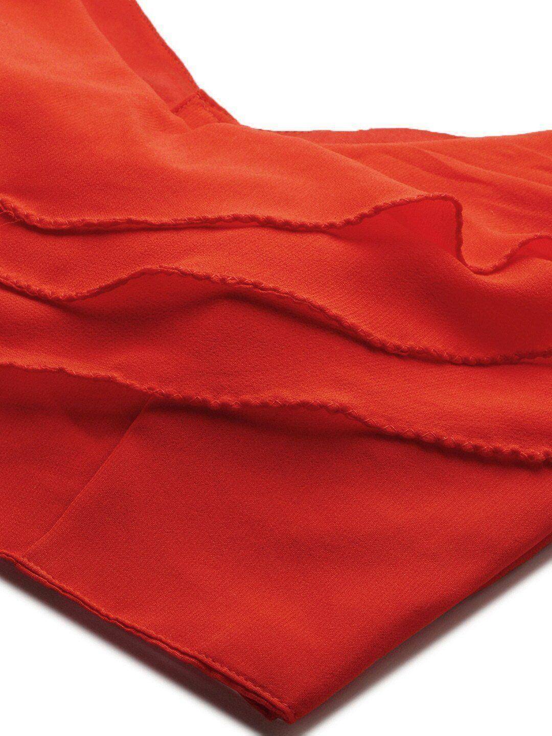 Vibrant red ethnic gown with ruffled detailing, perfect for Indian festive wear