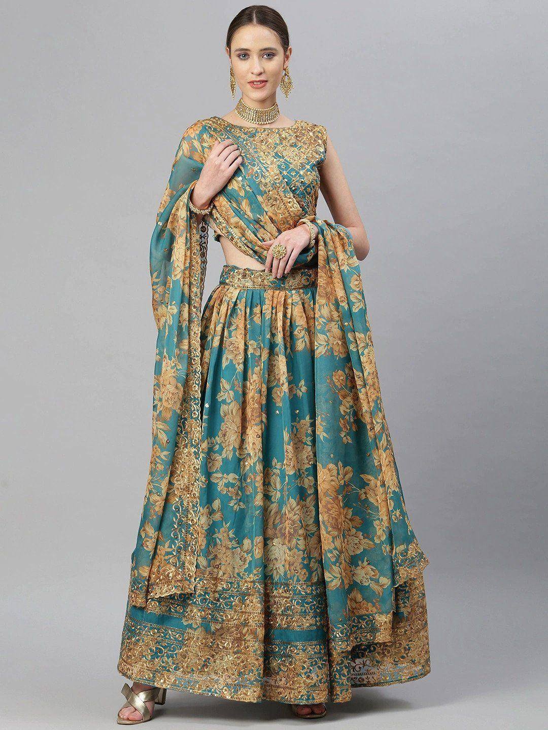 Teal and gold floral lehenga choli with embroidered dupatta, perfect for Indian ethnic occasions