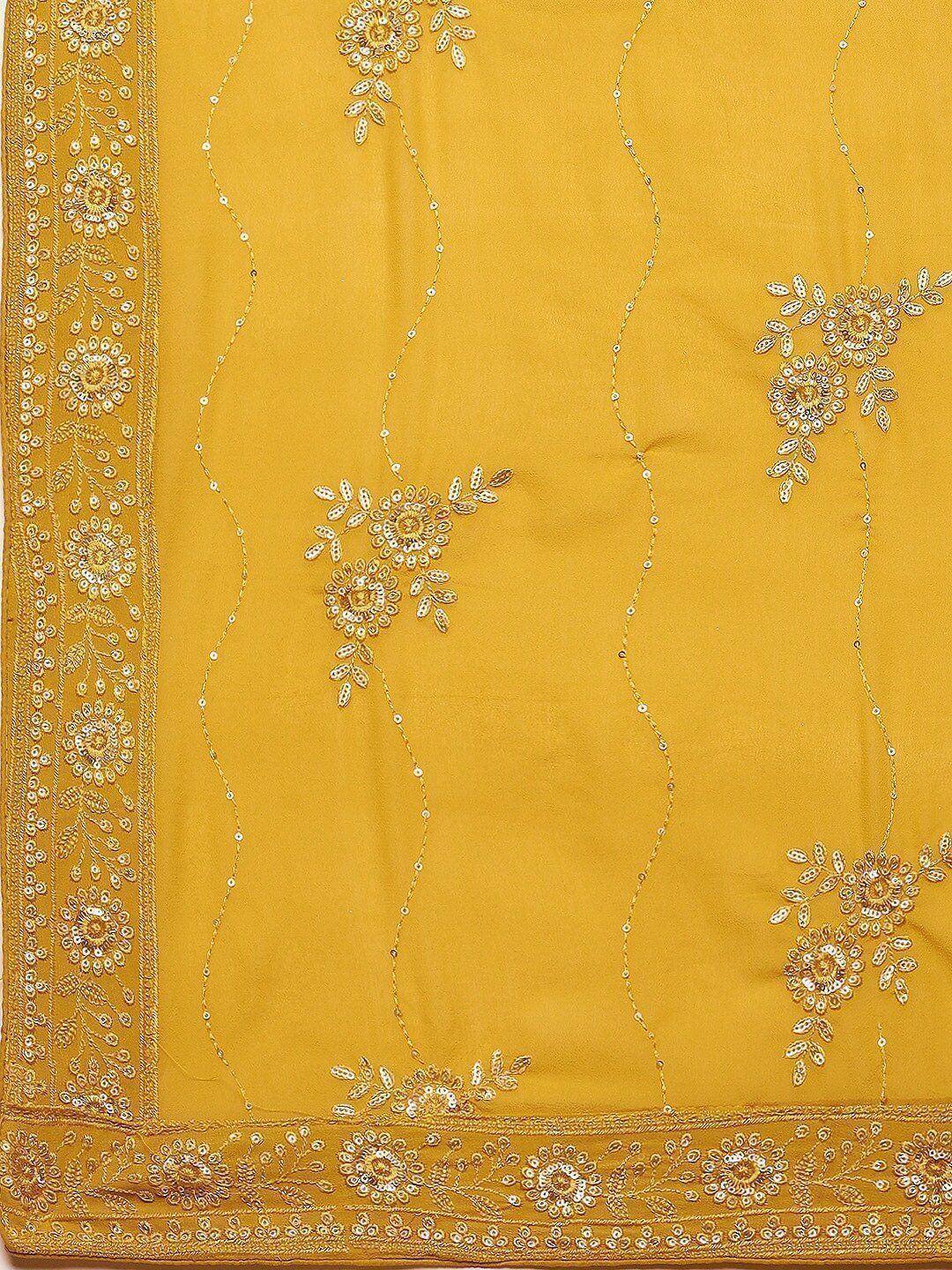 Yellow ethnic saree with floral embroidery and sequin detailing, perfect for Indian occasions