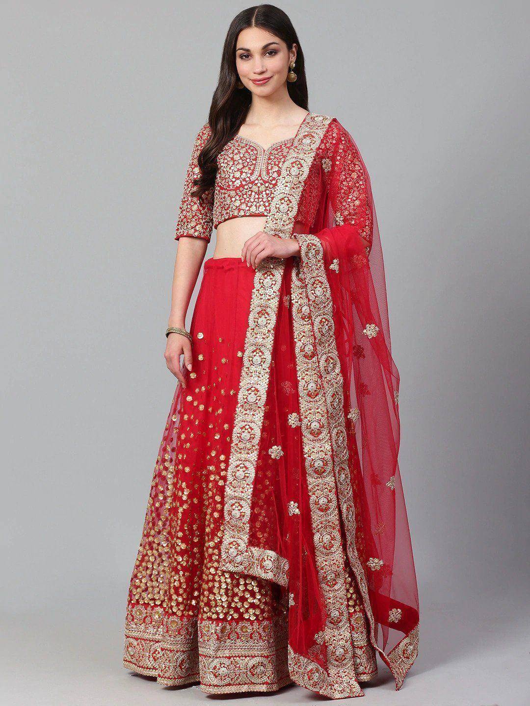 Red and gold embroidered lehenga choli with sheer dupatta, Indian ethnic wear for weddings and festivals