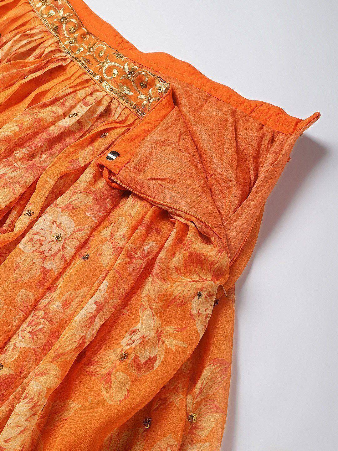 Orange floral printed ethnic skirt with gold embroidery and pleated waistband