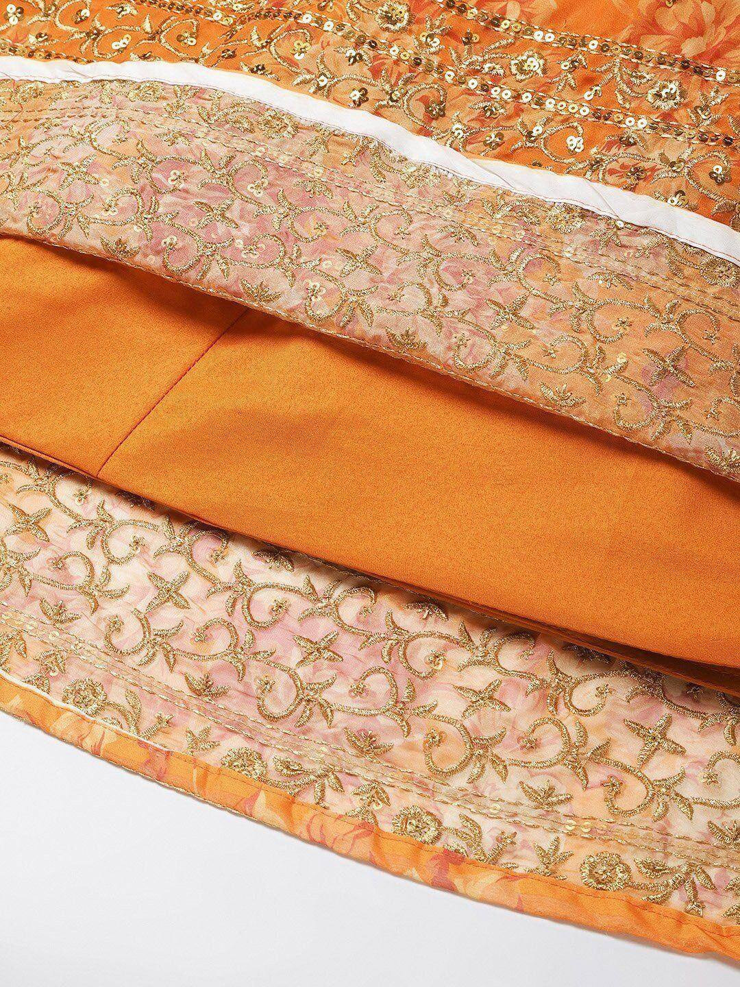 Orange and pink embroidered lehenga choli with gold sequin detailing, perfect for Indian ethnic wear