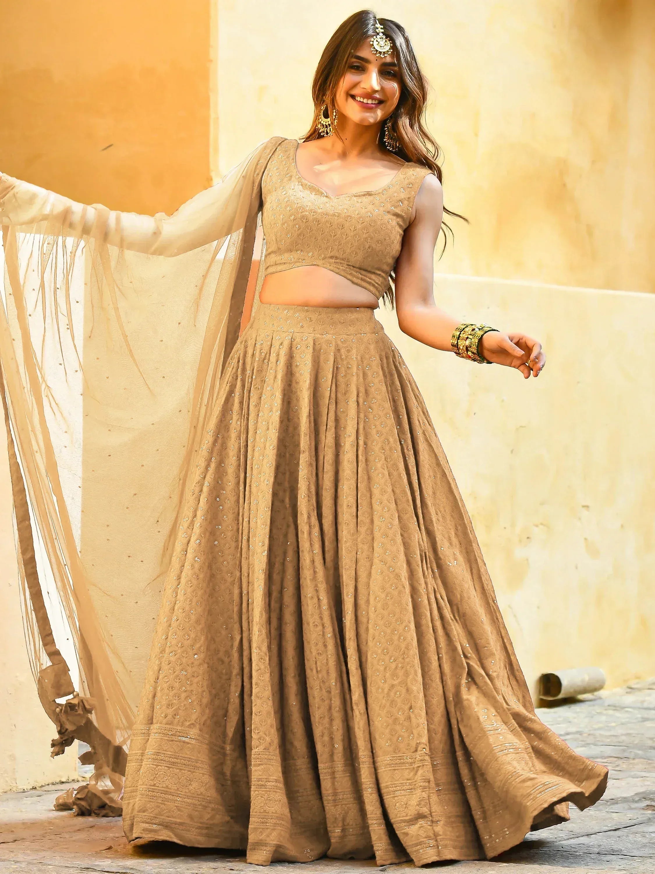 Beige embroidered lehenga choli with sheer dupatta, perfect for Indian ethnic occasions