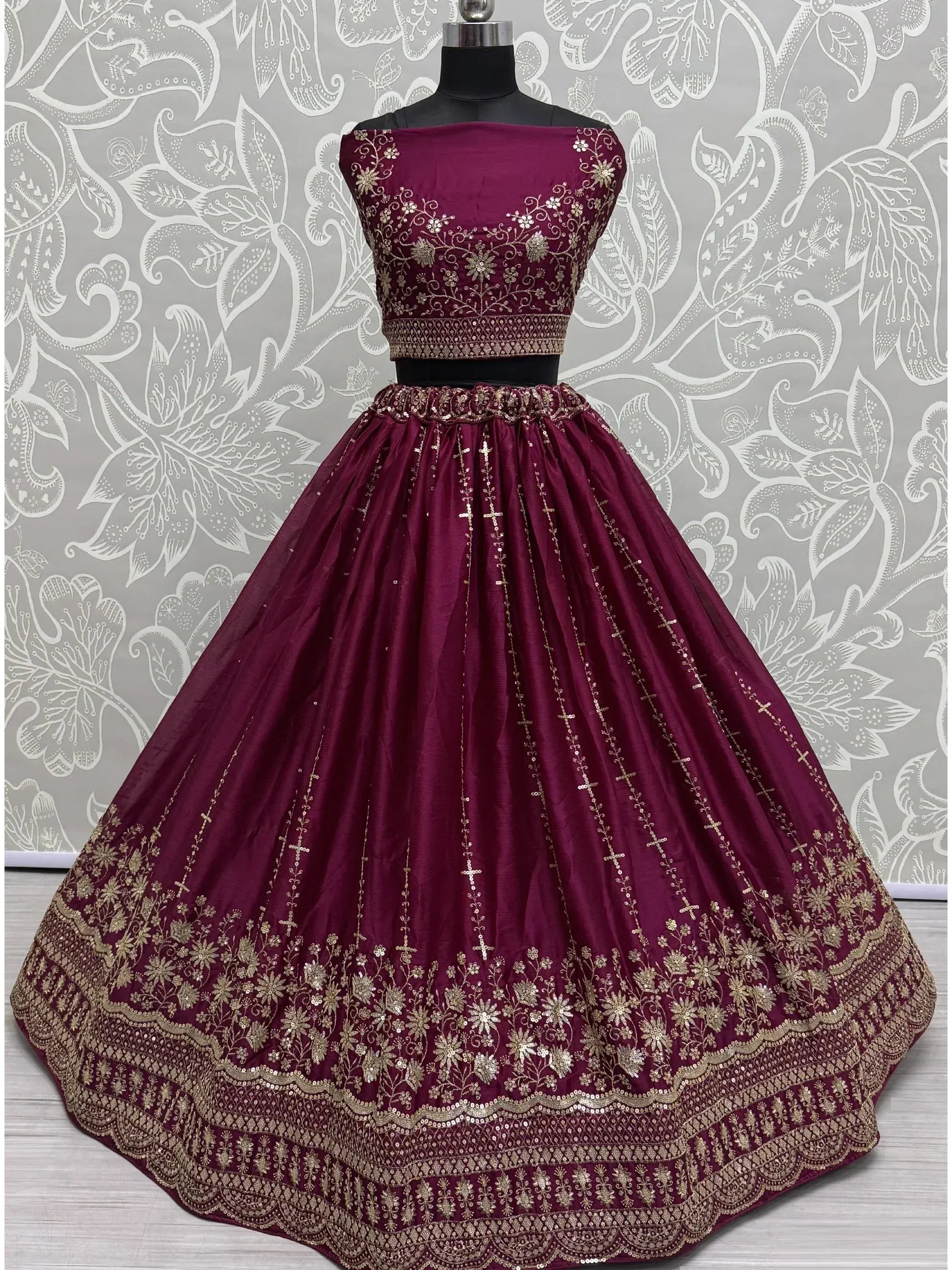 Burgundy designer lehenga choli with gold embroidery and sequins, ethnic wear for women