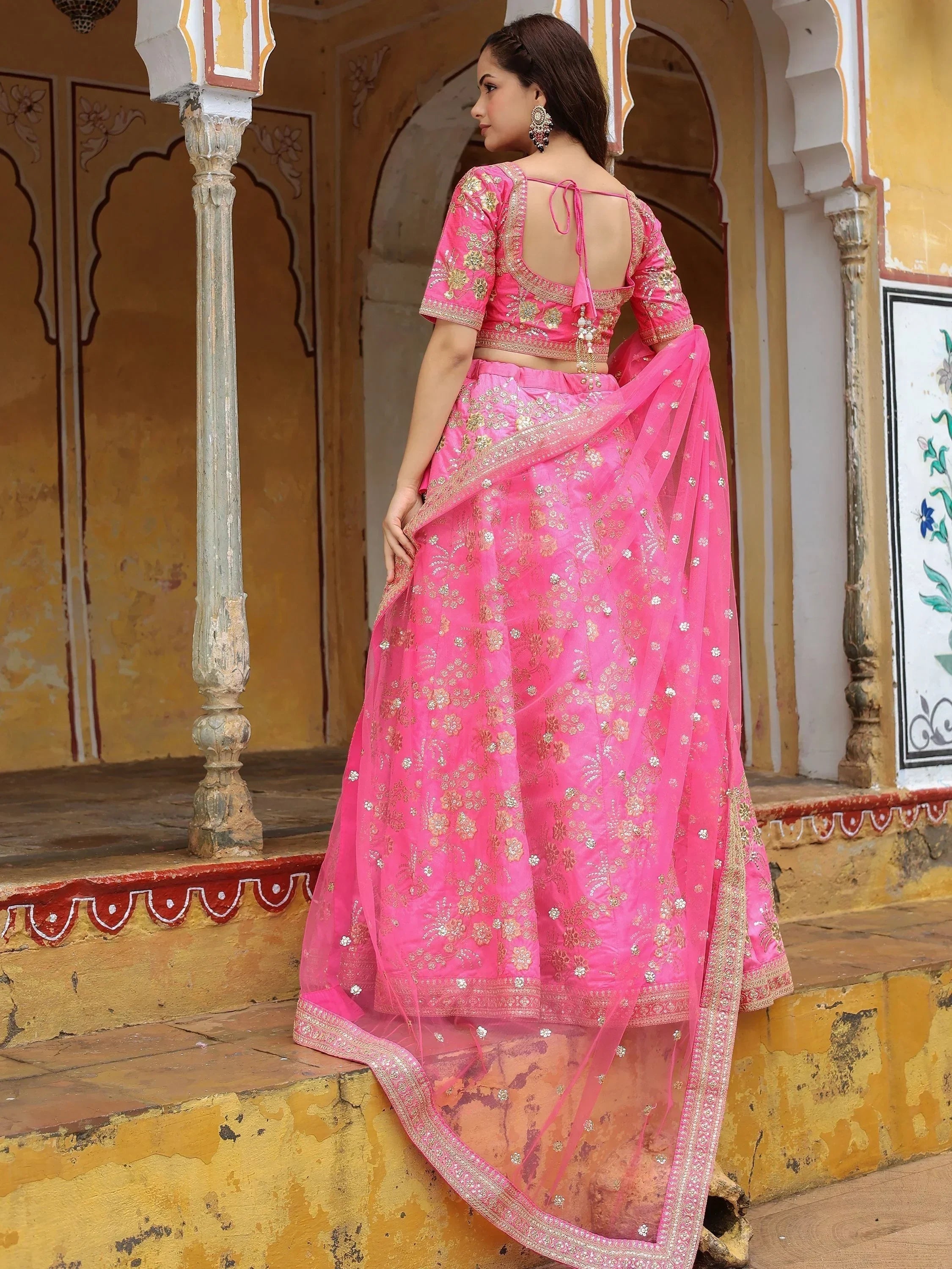 Pink embroidered lehenga choli with sheer dupatta, traditional Indian ethnic wear for women