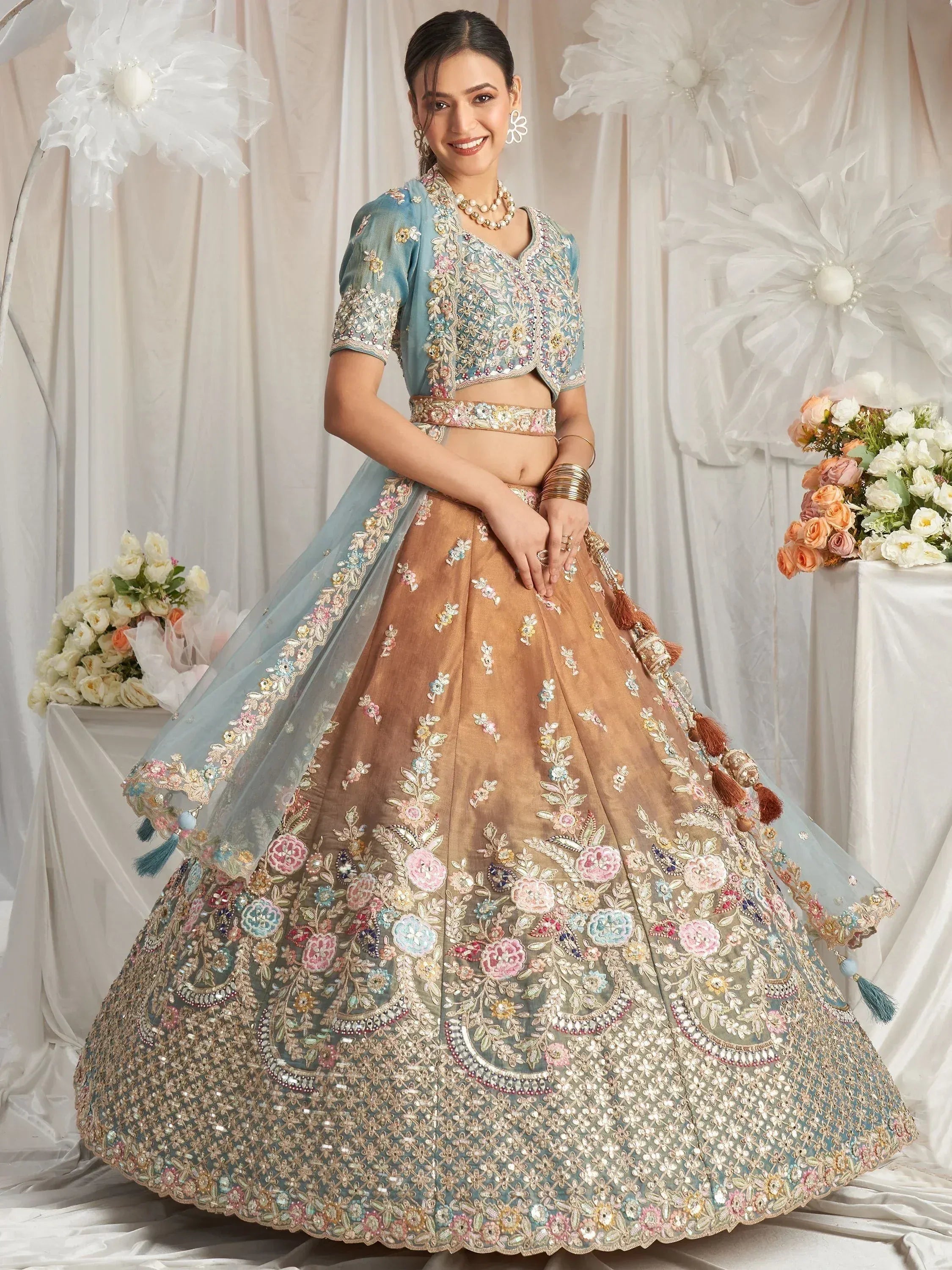 Elegant Indian lehenga choli with floral embroidery, perfect for weddings and festivals