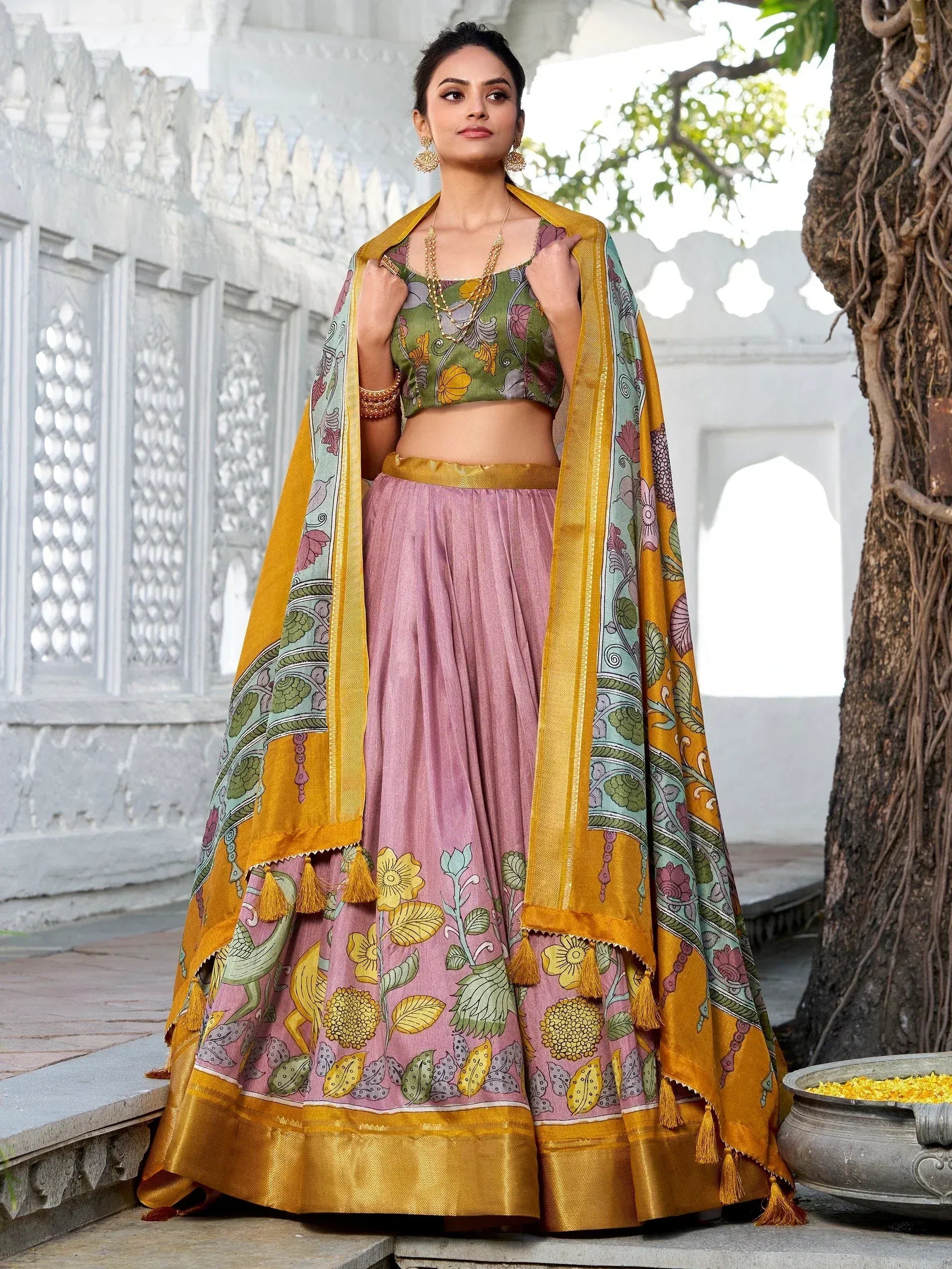 Woman in floral print lehenga choli with dupatta, Indian ethnic wear for festive occasions