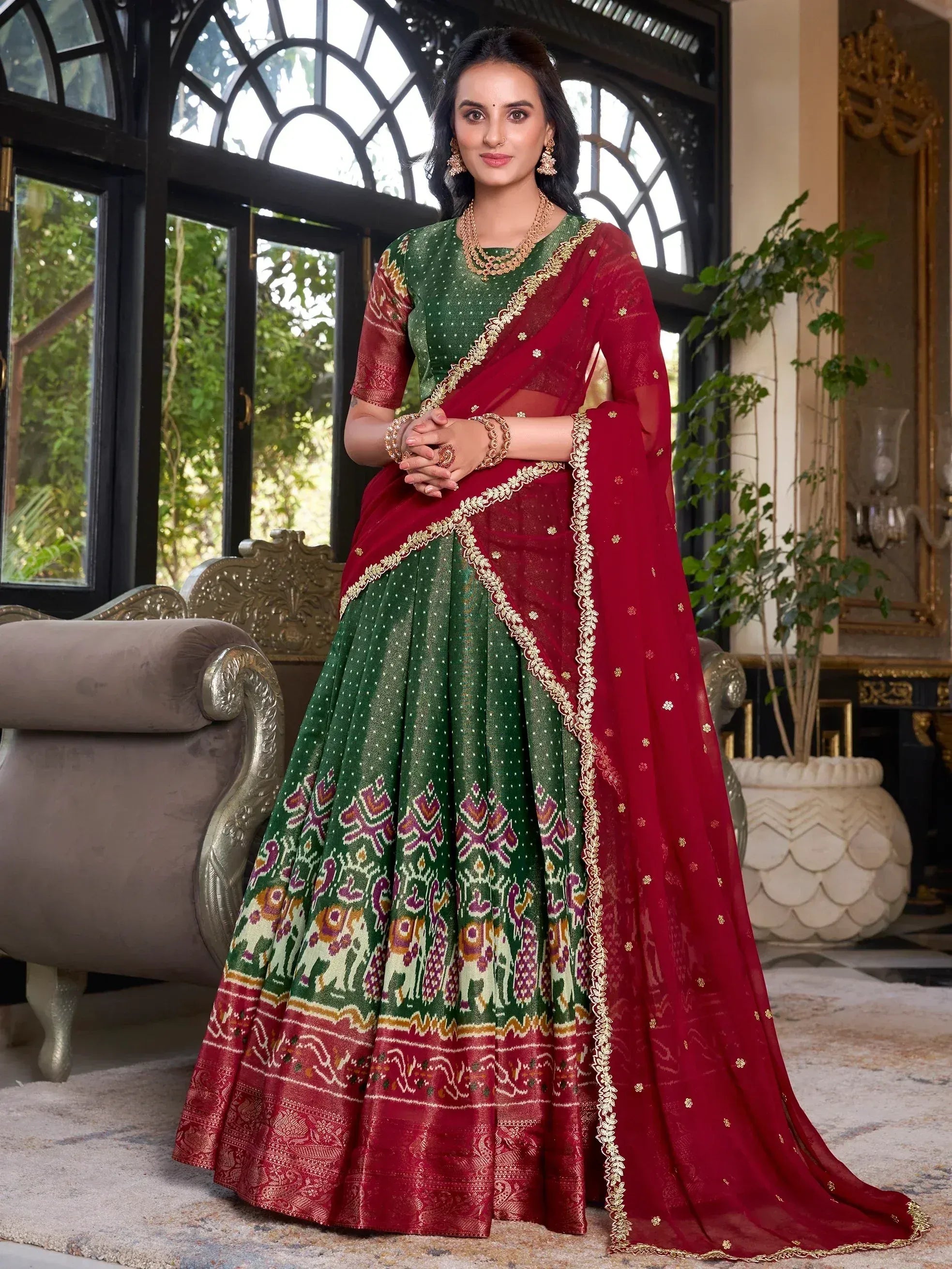 Green and maroon designer lehenga choli with gold embroidery, perfect for Indian ethnic wear occasions