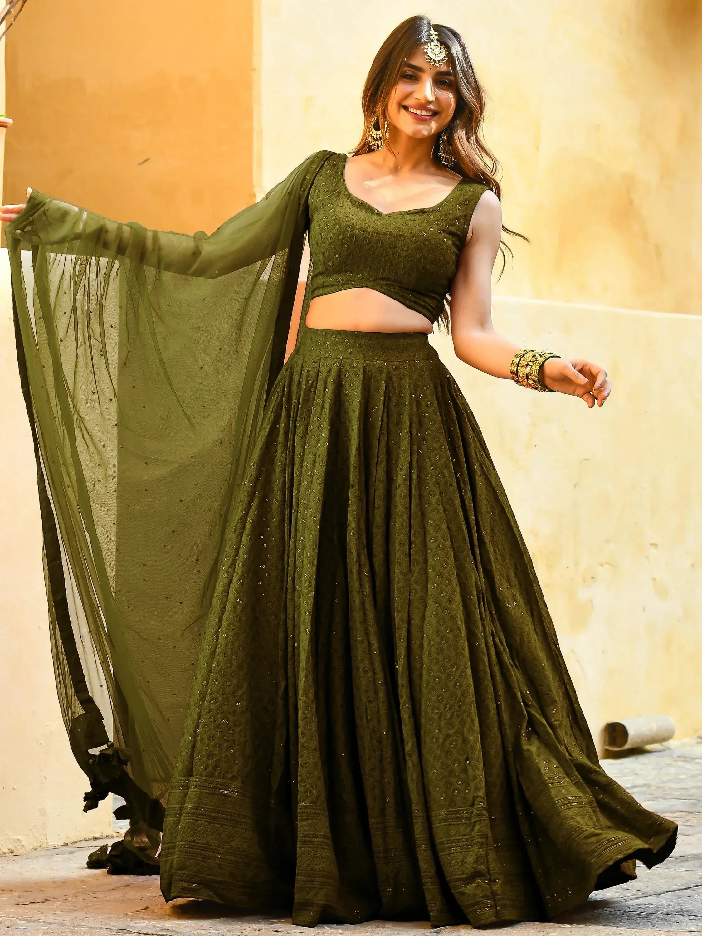 Olive green embroidered lehenga choli with sheer dupatta, perfect for Indian ethnic wear occasions