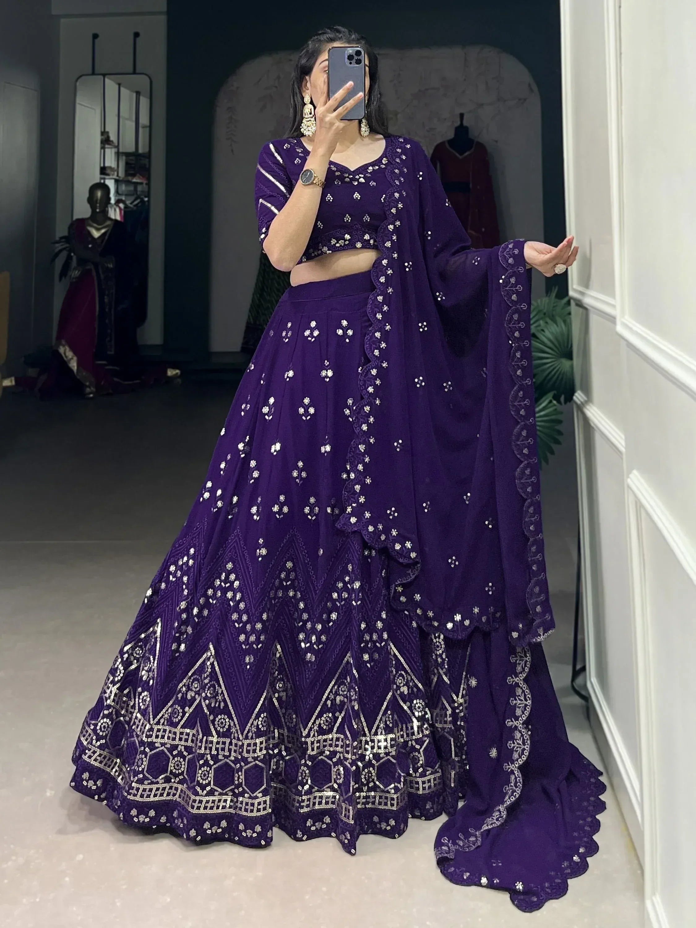 Purple designer lehenga choli with silver embroidery, perfect for Indian ethnic wear events