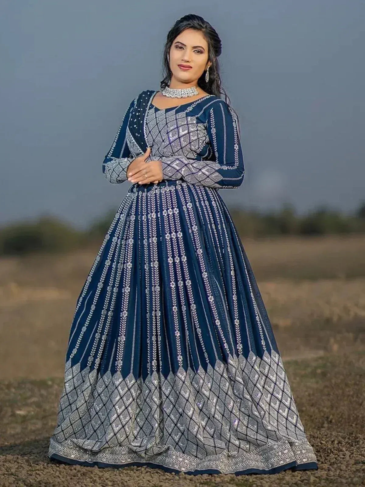 Navy blue and silver embroidered lehenga choli with geometric patterns, perfect for Indian ethnic occasions