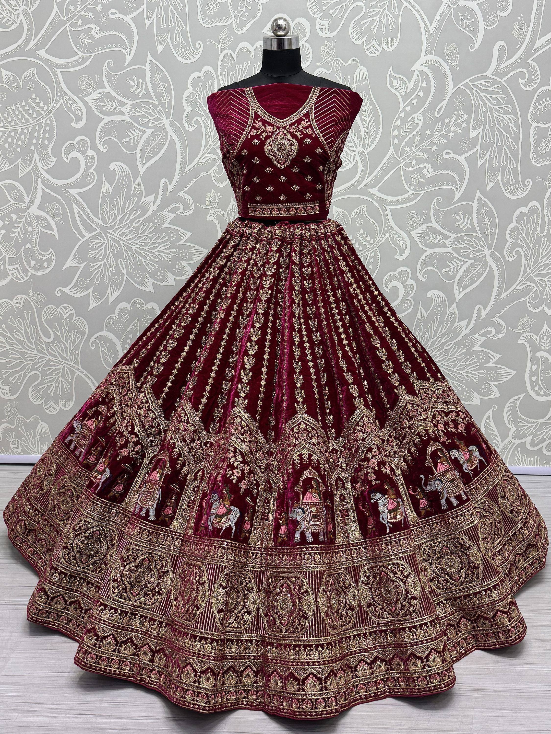 Maroon velvet lehenga choli with gold embroidery and elephant motifs, Indian ethnic wear
