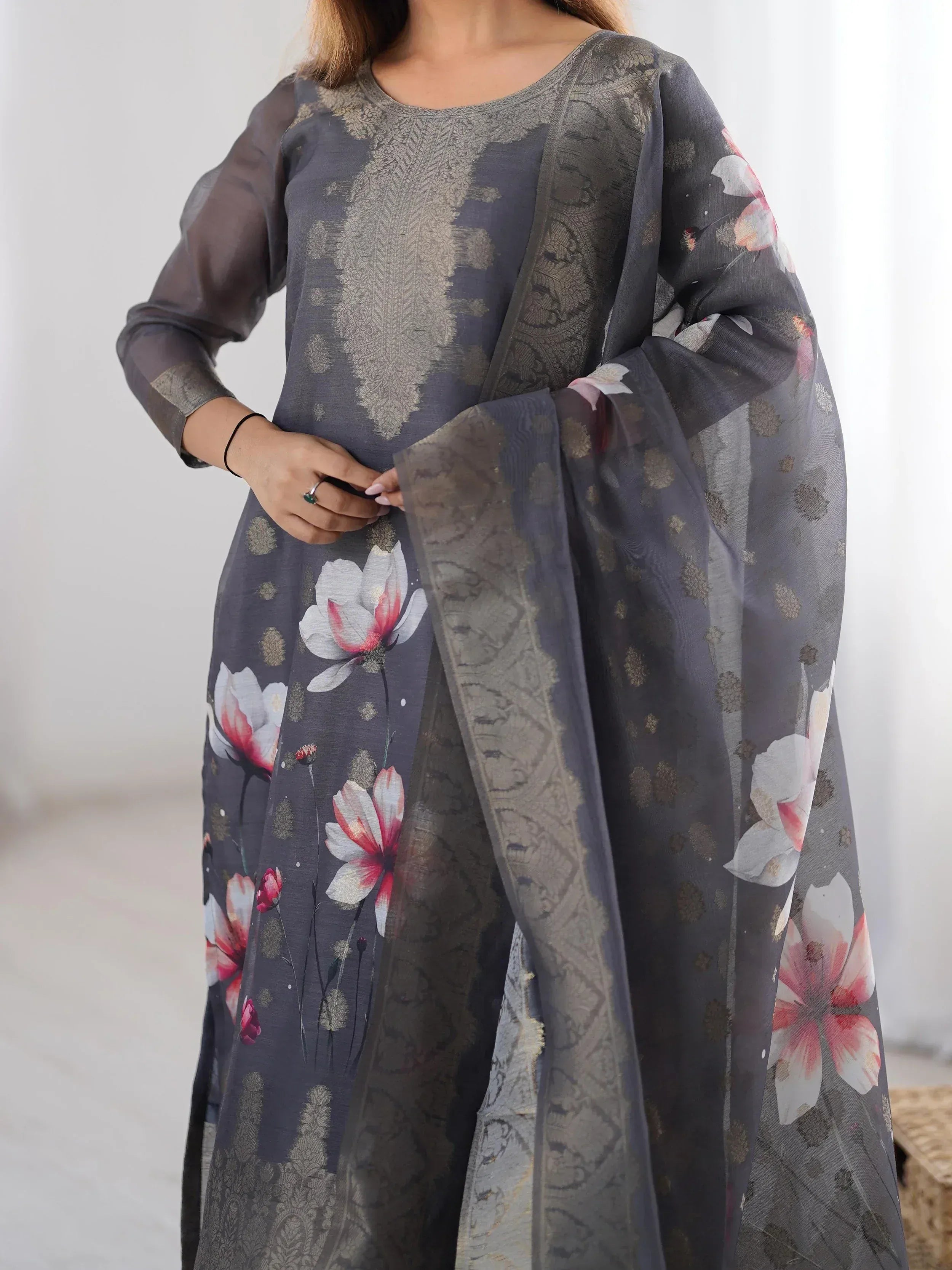 Grey floral print salwar kameez with gold embroidery and sheer dupatta, ethnic Indian wear