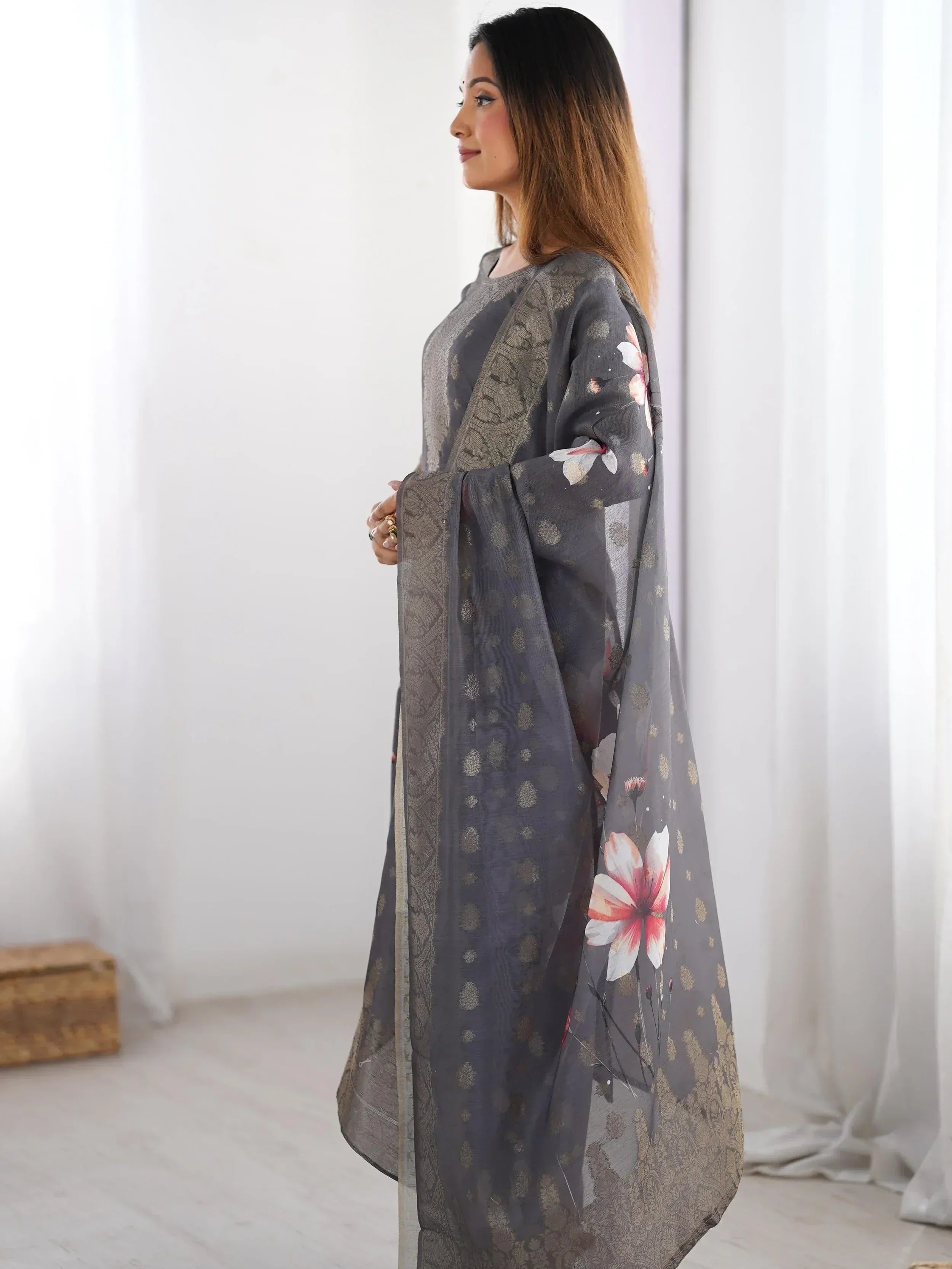 Grey floral printed ethnic gown with gold motifs, perfect for Indian occasions and festive wear.