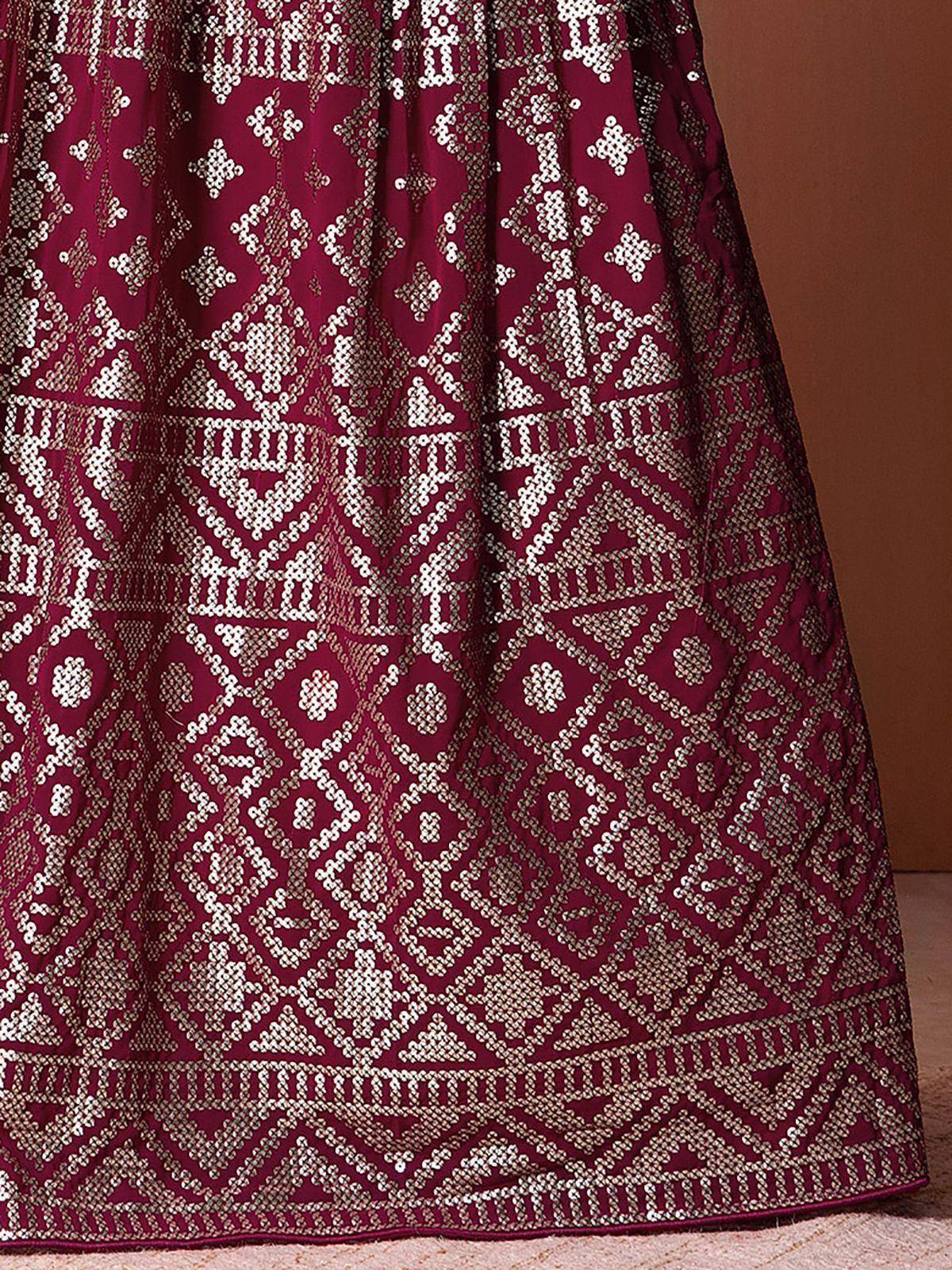 Maroon lehenga with intricate gold geometric embroidery, ethnic Indian wear