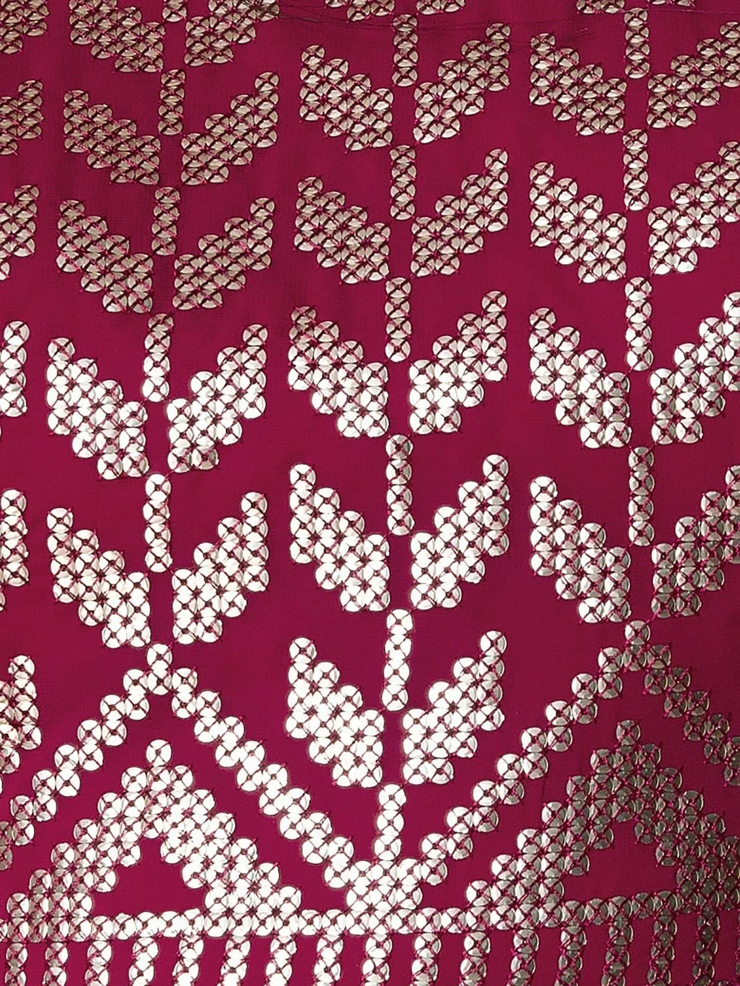 Maroon ethnic fabric with silver mirror work and floral embroidery, ideal for designer lehenga or saree
