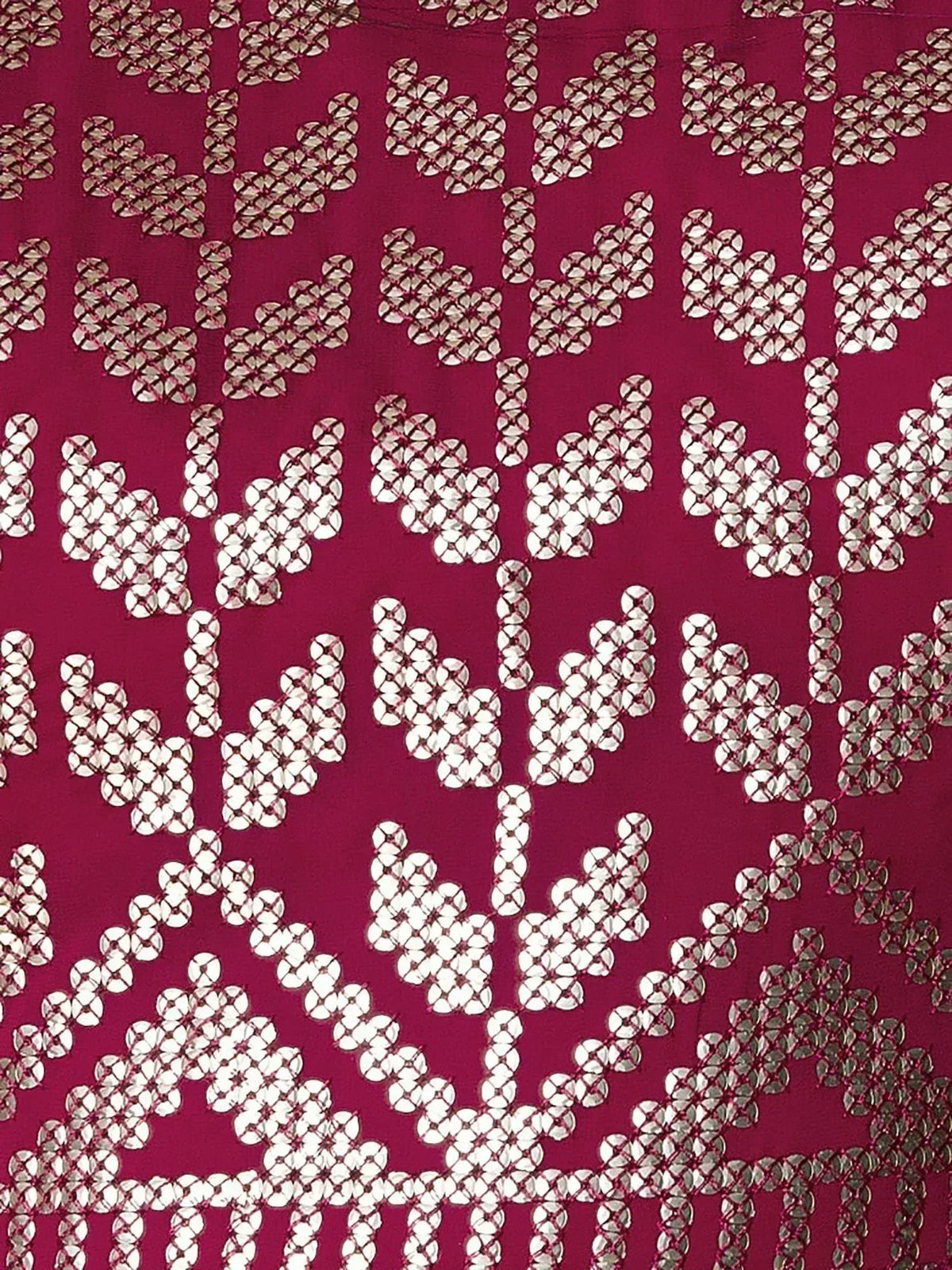 Maroon ethnic fabric with silver mirror work and floral embroidery, ideal for designer lehenga or saree