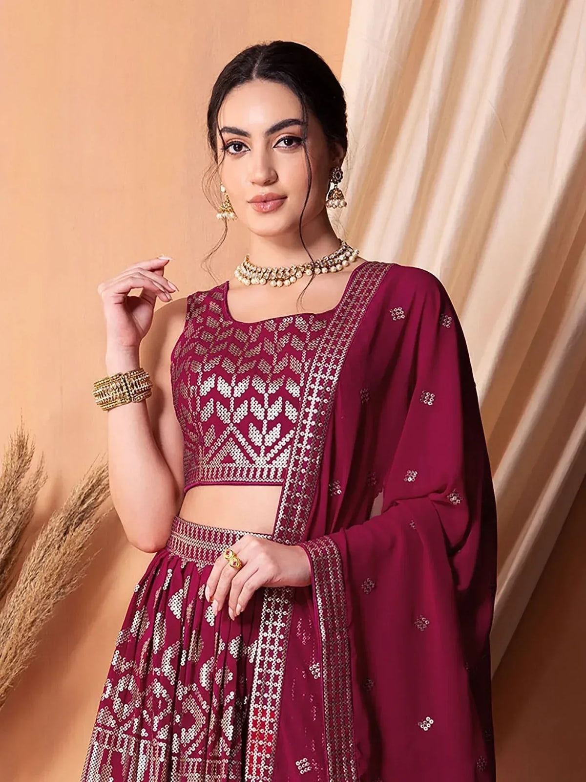 Maroon embroidered lehenga choli with sequin work, perfect for Indian ethnic wear occasions